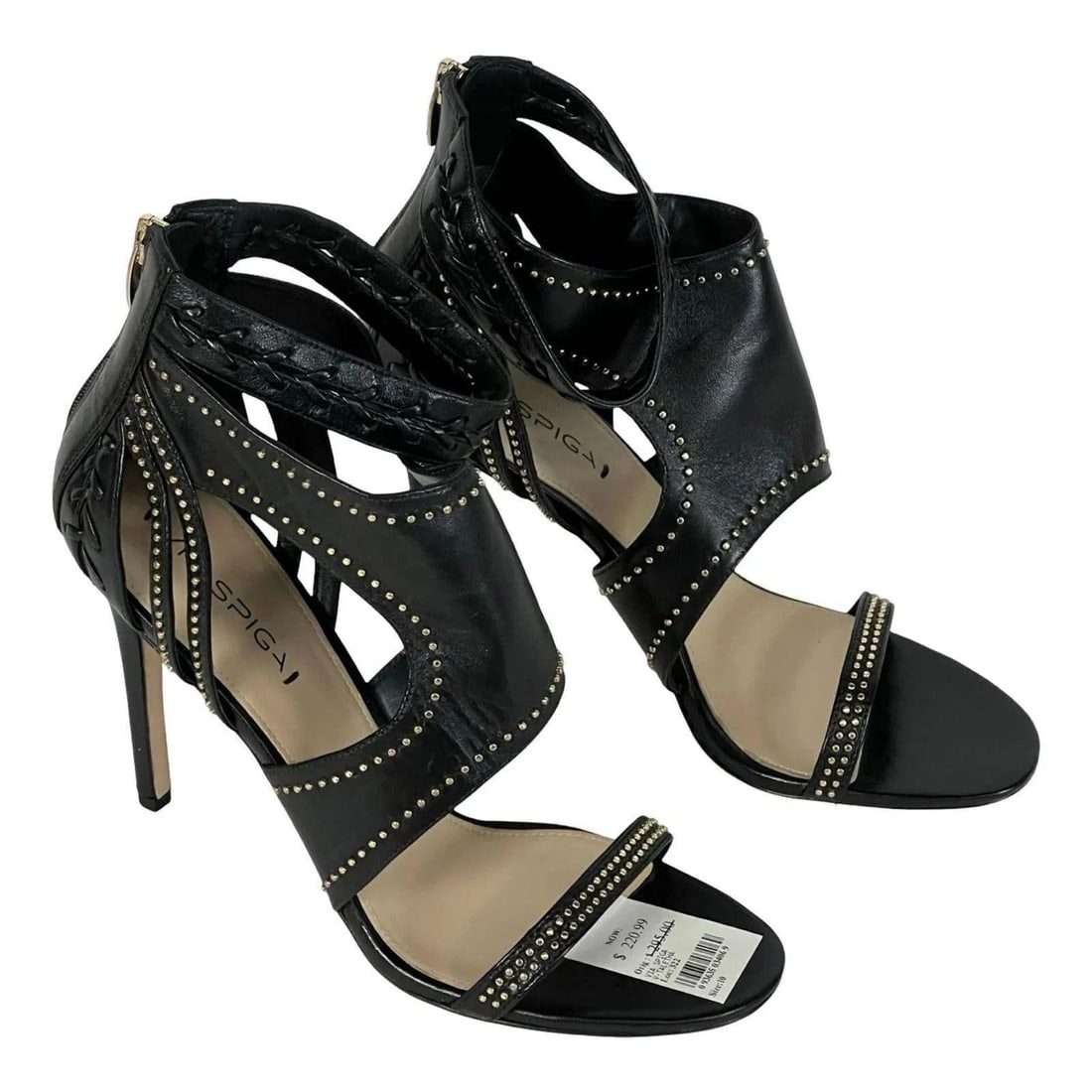 Via Spiga V-Taletha Black Leather Sandal Heels: Chic and bold, these Via Spiga V-Taletha heels feature supple black leather uppers adorned with edgy gold-tone stud accents. The wraparound braided ankle straps and modern cut-out design create an