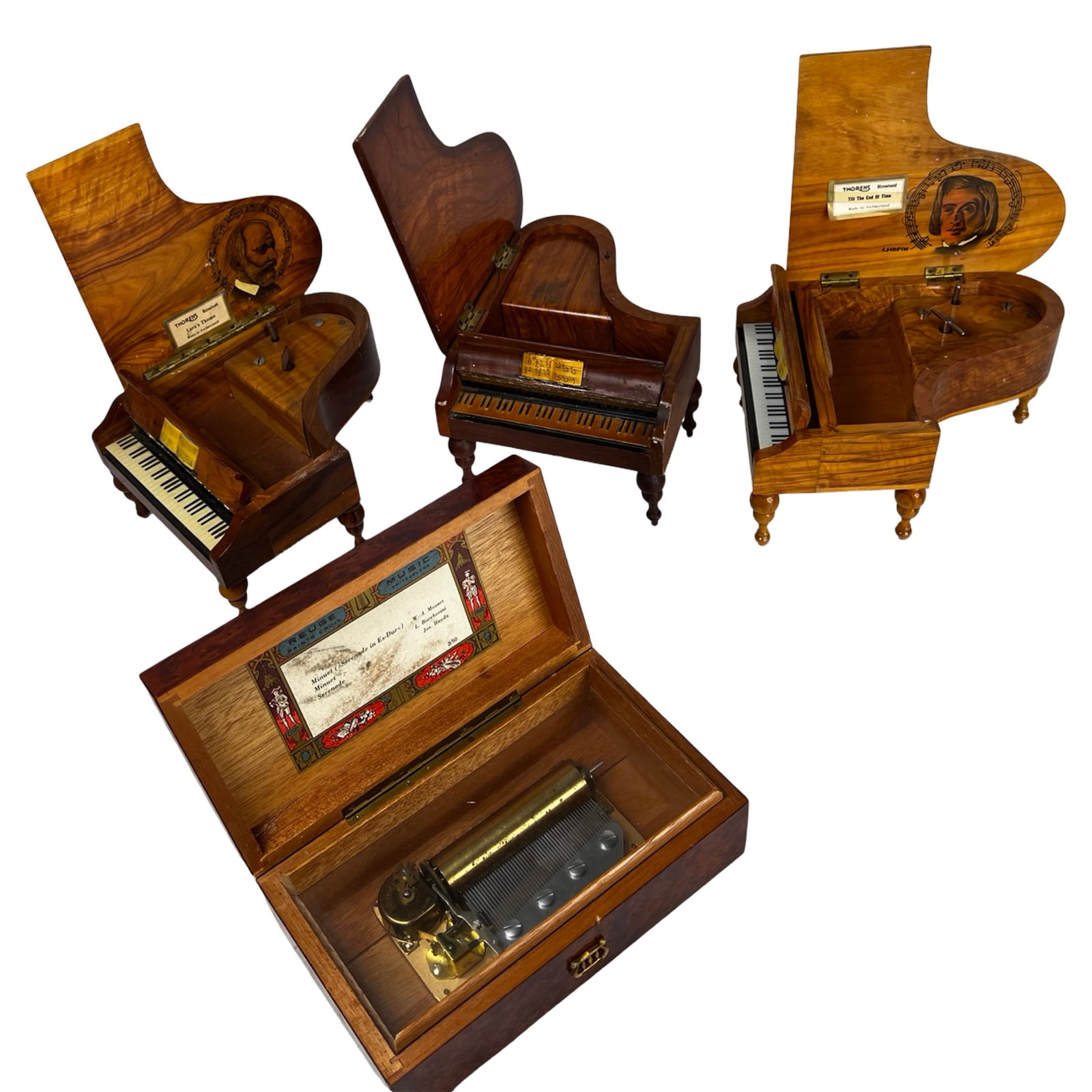 Thorens Reuge Swiss Music Box Assortment: Attractive collection of vintage music boxes, including three miniature grand piano form examples with Swiss Thorens movements, each crafted in richly grained wood cases with decorative portrait lids.