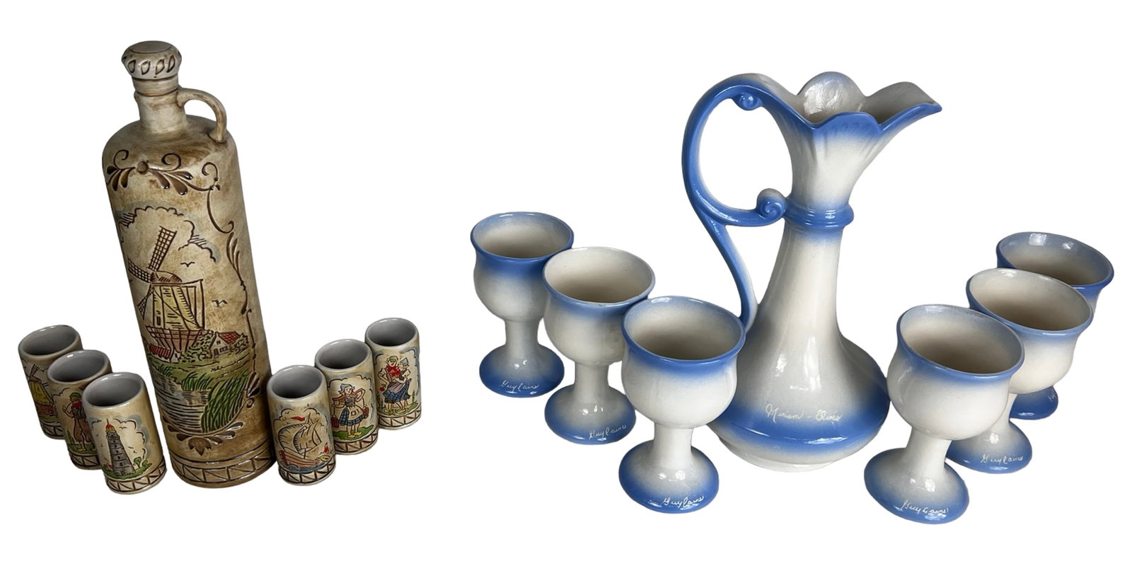 Vintage Ceramarte Decanter Set & Ceramic Pitcher S: A charming and decorative grouping of vintage ceramic barware and table pieces, featuring a hand-painted Ceramarte decanter set alongside a coordinated blue and white pitcher and goblet set. The Ceram
