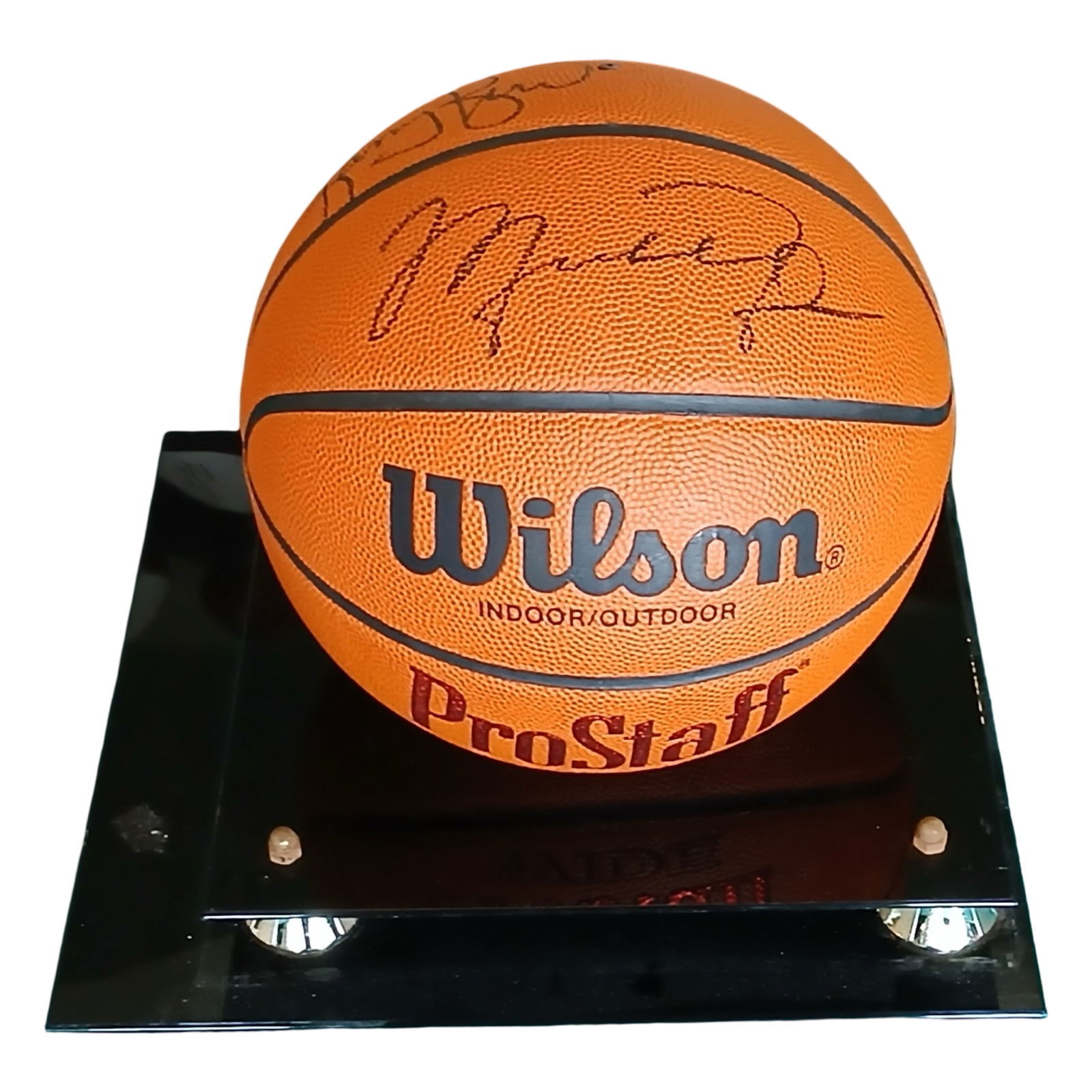 Michael Jordan, Bird & Barkley Signed Basketball: Official Wilson Pro Staff basketball signed by three NBA legends: Michael Jordan, Larry Bird, and Charles Barkley. Each signature is boldly executed in black marker across multiple panels, creating a