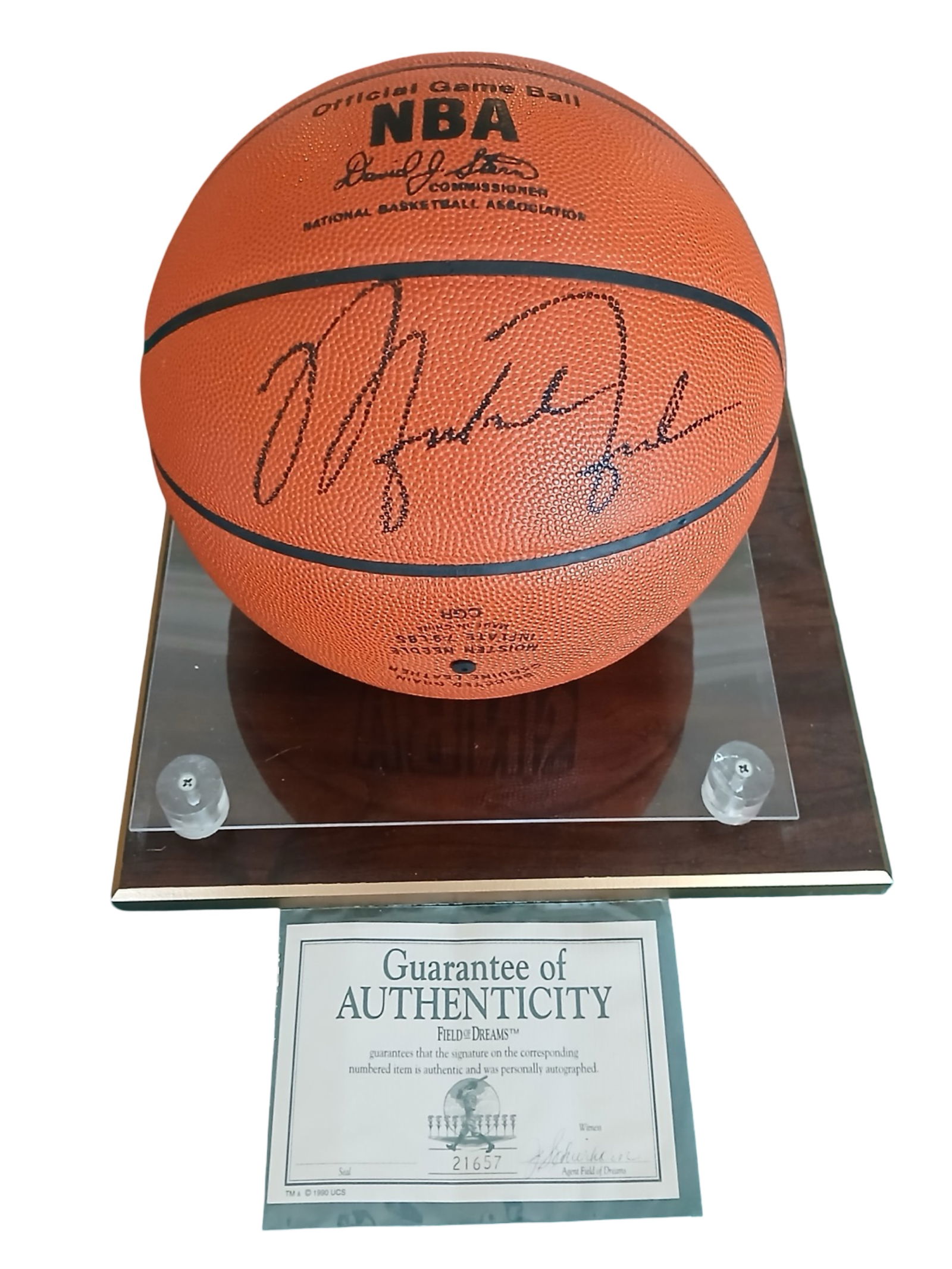 Michael Jordan Signed Official NBA Game Basketball: Official Spalding NBA game ball autographed by NBA icon Michael Jordan. The signature is boldly placed across a central panel, showcasing Jordan's unmistakable flowing autograph with strong display pr