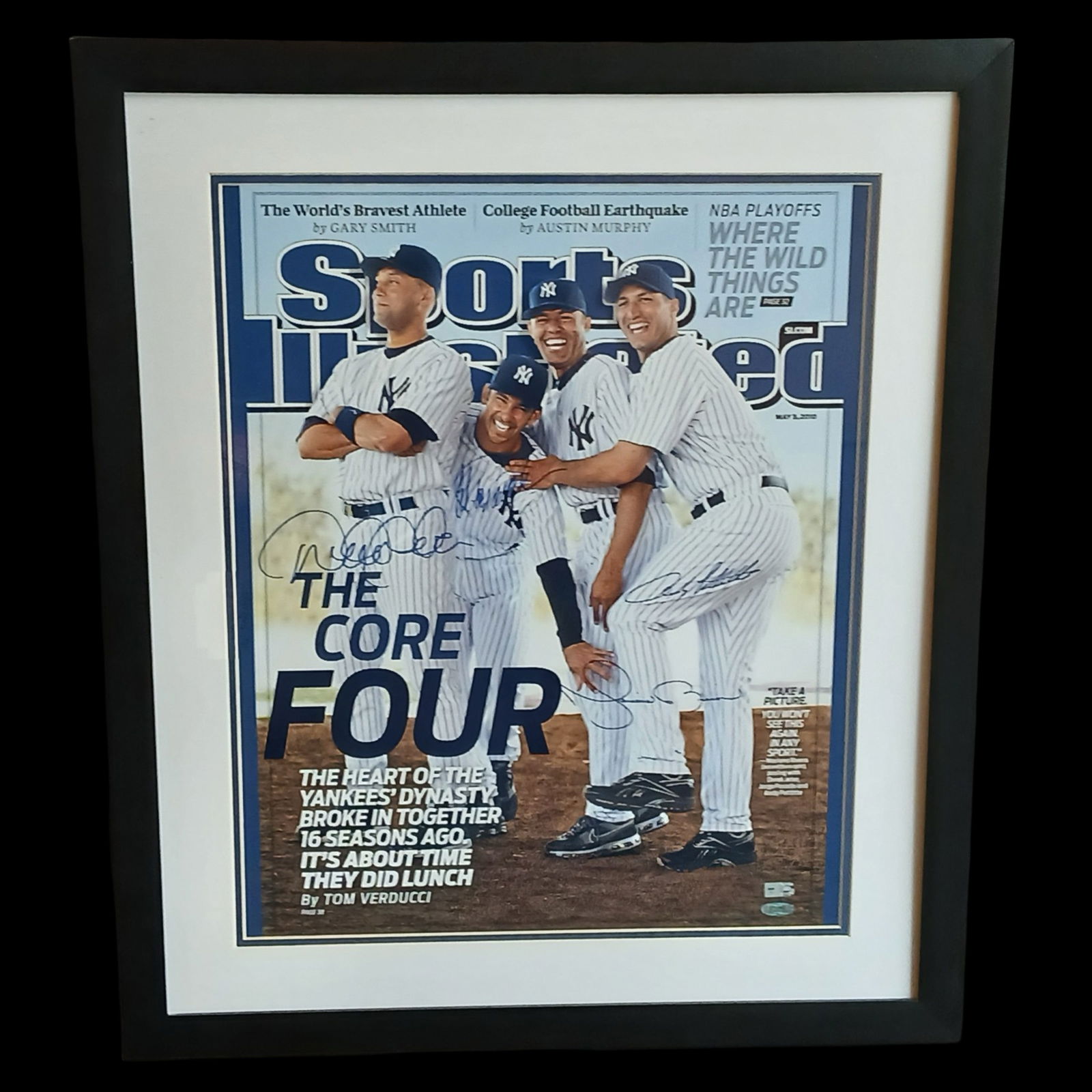 New York Yankees "Core Four" Signed SI Cover: Framed Sports Illustrated display titled "The Core Four", featuring members of the legendary New York Yankees dynasty. The cover showcases Derek Jeter, Mariano Rivera, Andy Pettitte, and Jorge Posada,