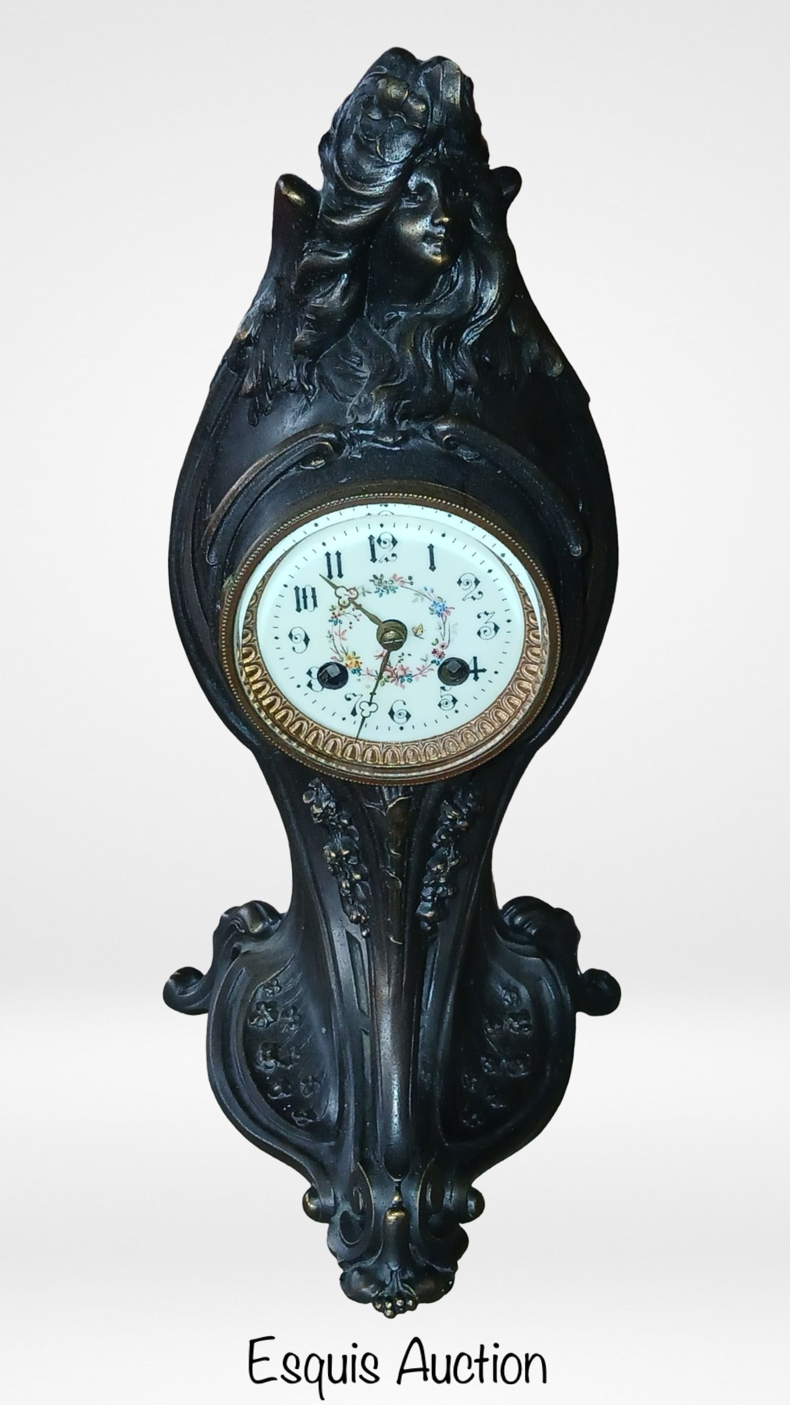 Antique French Art Nouveau Figural Mantel Clock: Elegant antique French Art Nouveau mantel clock featuring a beautifully sculpted figural case with a flowing female form and floral motifs. The design reflects classic Art Nouveau styling, with organi