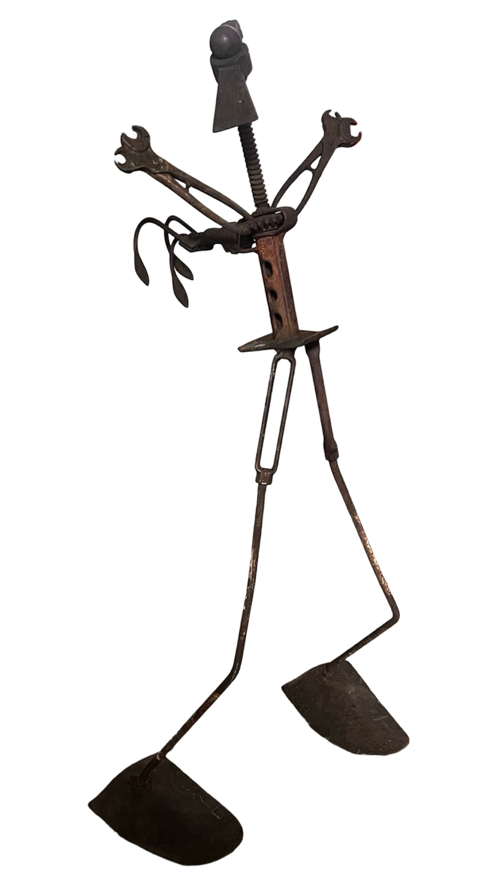Large Folk Art Welded Metal Garden Sculpture: Unusual and expressive vintage garden sculpture constructed from salvaged metal and tool elements, formed into a whimsical standing figure. This hand-assembled piece features a combination of welded c