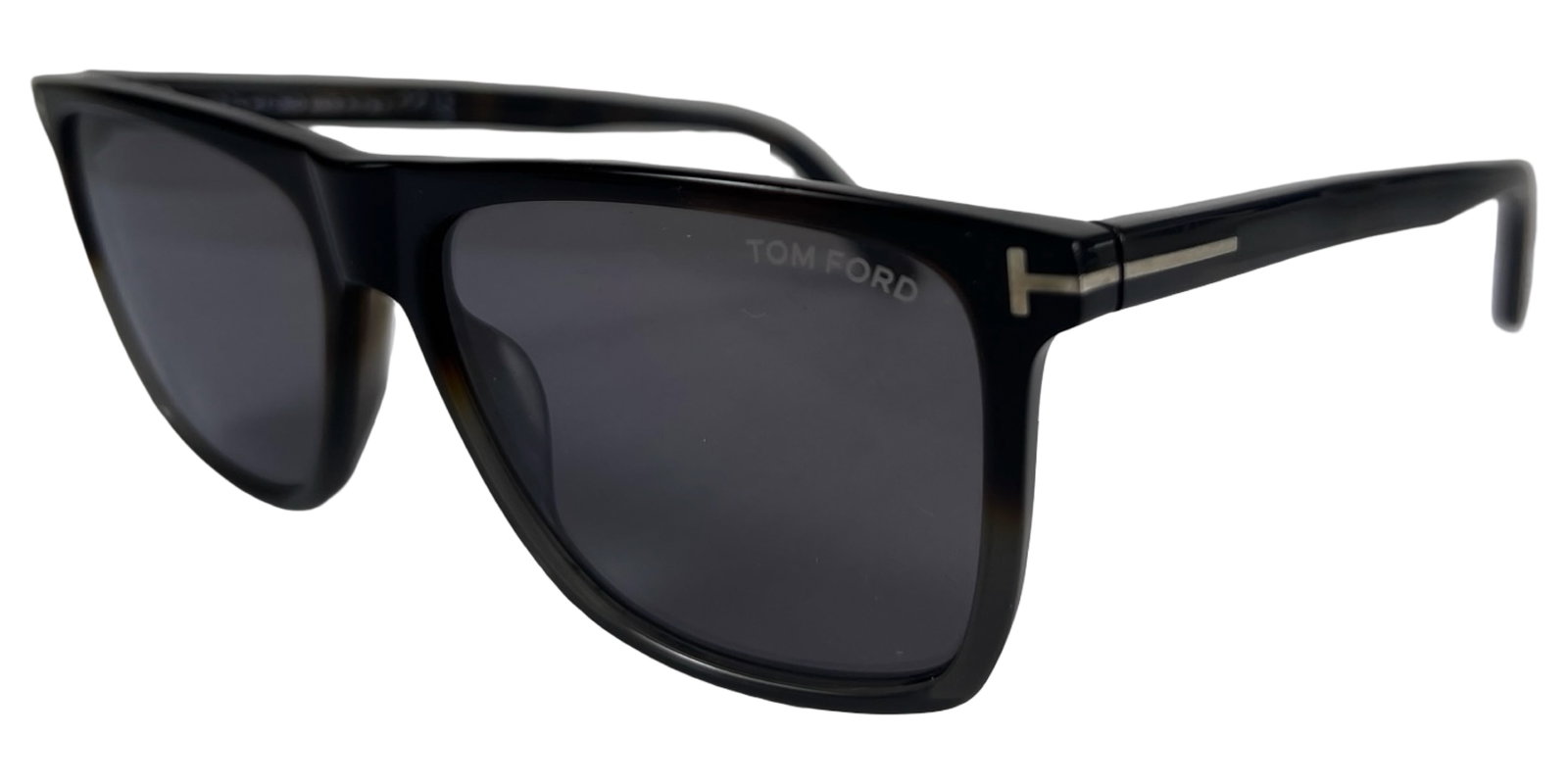 Tom Ford FT0832 Fletcher Men's Sunglasses: Tom Ford Fletcher model sunglasses, style FT0832, featuring a classic rectangular frame in dark acetate with signature gold-tone "T" accents at the temples. Fitted with dark tinted lenses for a sleek,