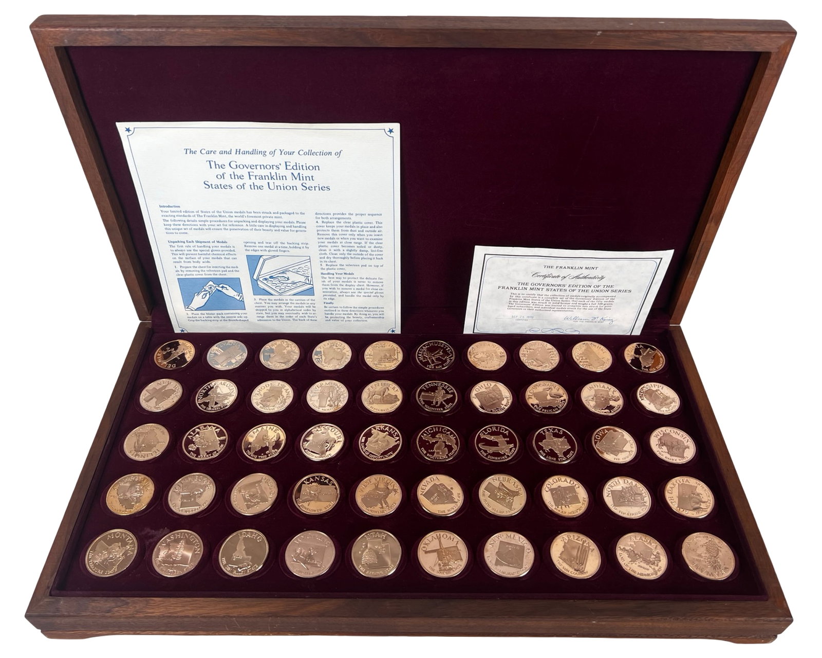 Franklin Mint States of the Union Bronze Medal Set: Impressive complete set of The Franklin Mint Governors Edition States of the Union Series, presented in its original fitted wooden display case with rich burgundy lining and accompanied by the