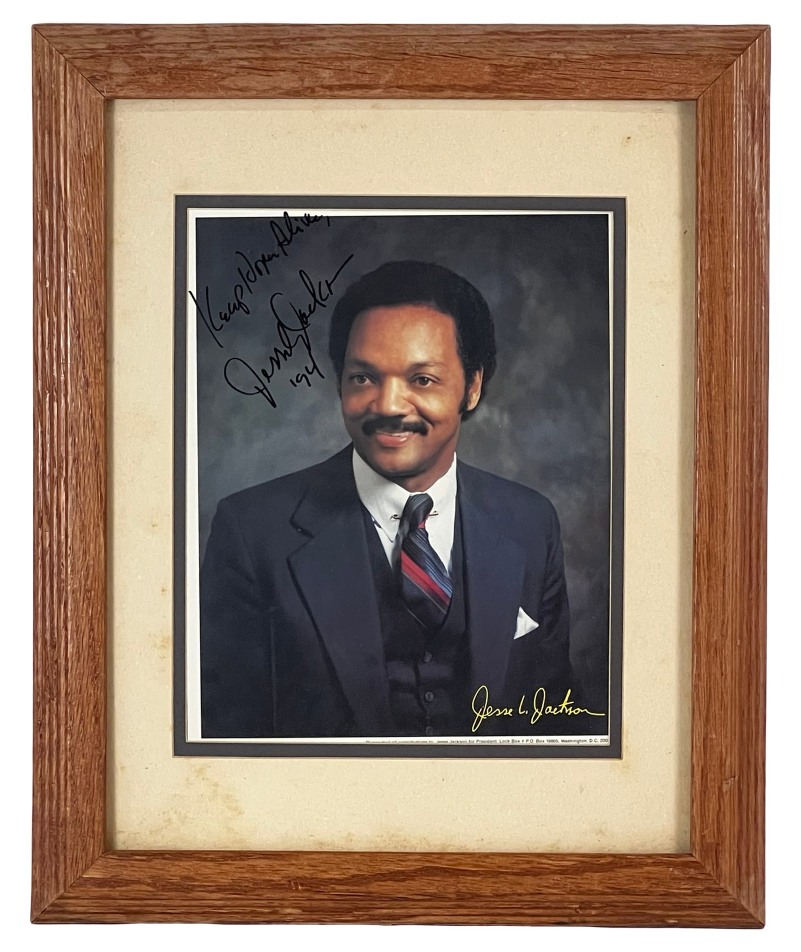 Jesse L. Jackson Signed Autographed Photograph: Color autographed photograph of Jesse L. Jackson, shown in a formal portrait wearing a suit and tie.The photograph is boldly signed and inscribed "Keep Hope Alive," along with a personalized message a
