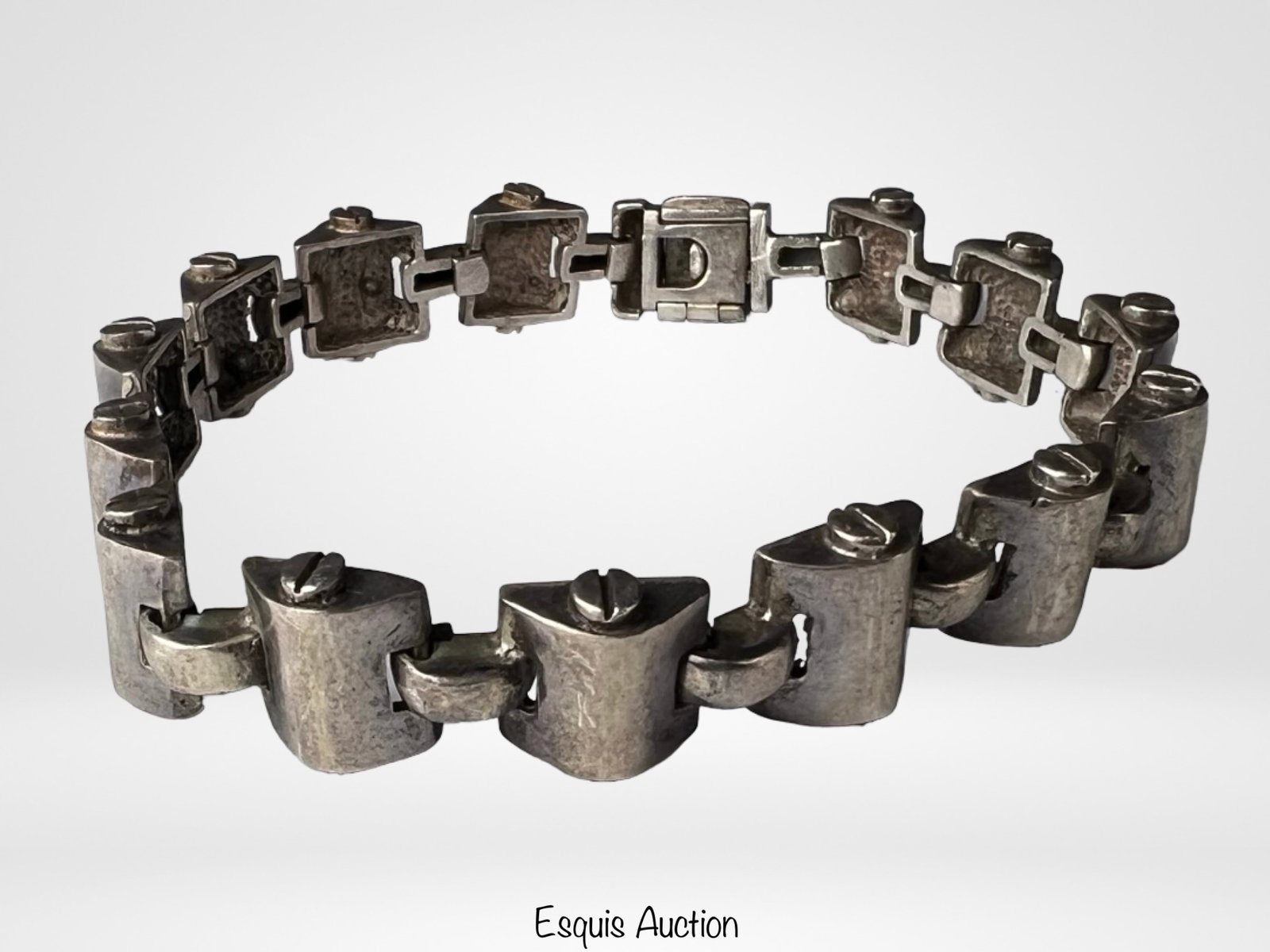 Massive Men's Sterling Silver Industrial Bracelet: Heavy sterling silver bracelet featuring bold, sculptural link construction with an industrial-inspired design. Each segment is formed with solid, curved elements connected by pivoting links, accented