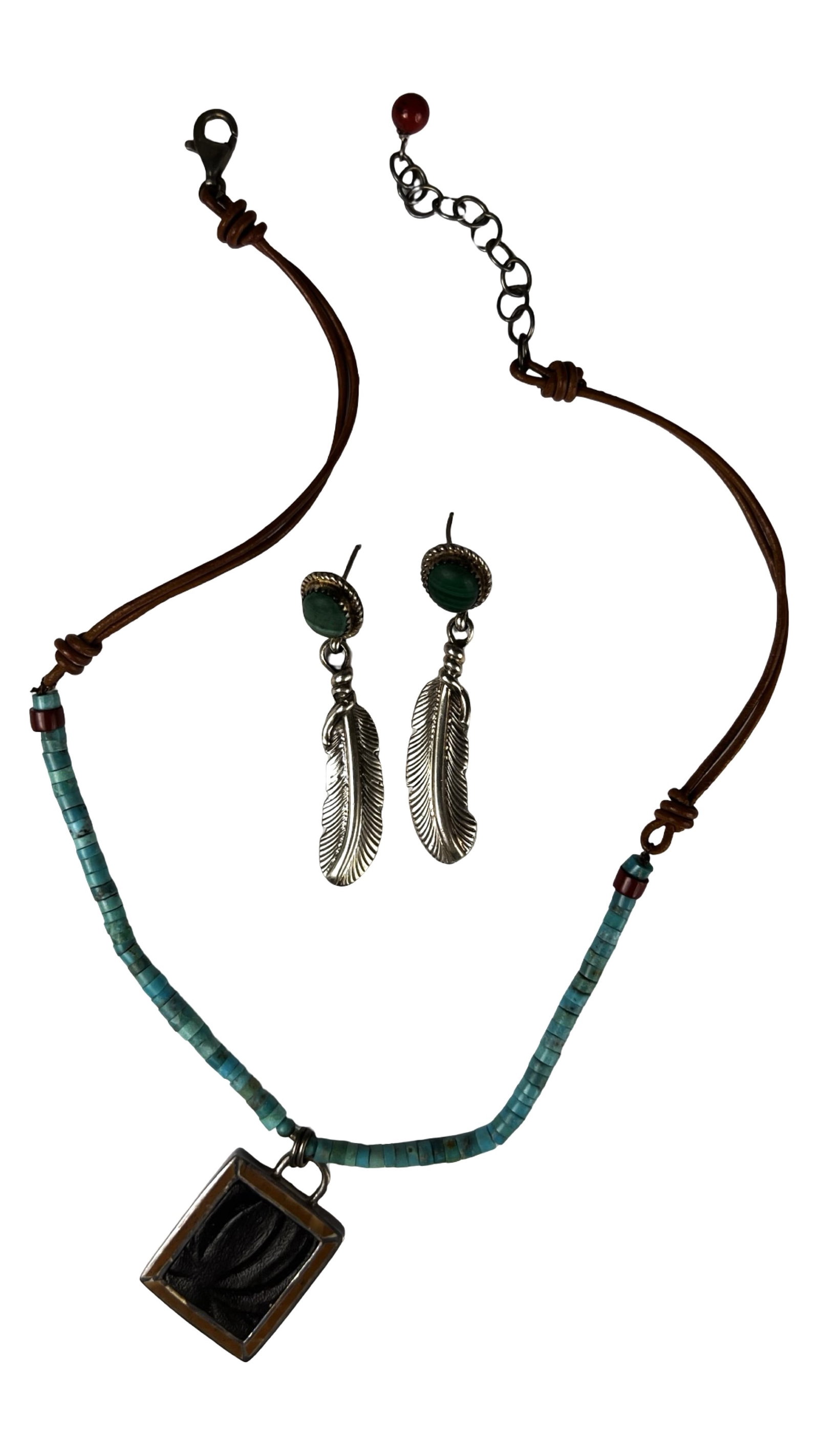 Native American Sterling Silver Jewelry: Native American sterling silver necklace featuring turquoise heishi beads with leather cord ends and a rectangular pendant. Included is a matching pair of Native American sterling silver dangle earrin