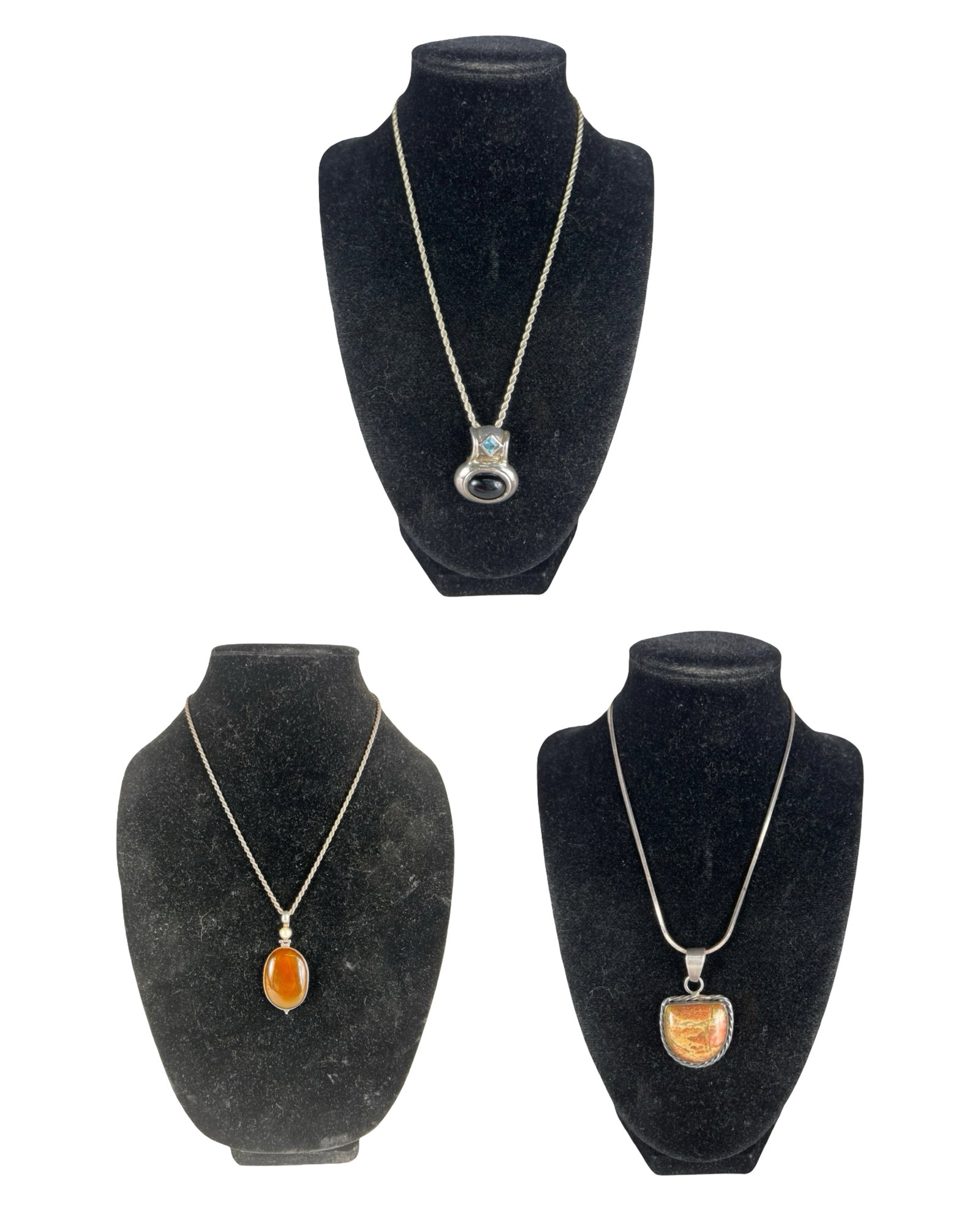 Sterling Silver Necklaces w Carnelian Jasper Onyx: Group of sterling silver necklaces featuring three substantial stone pendants. Includes a large oval carnelian pendant with soft translucent orange tones, a polished jasper pendant with natural earthy