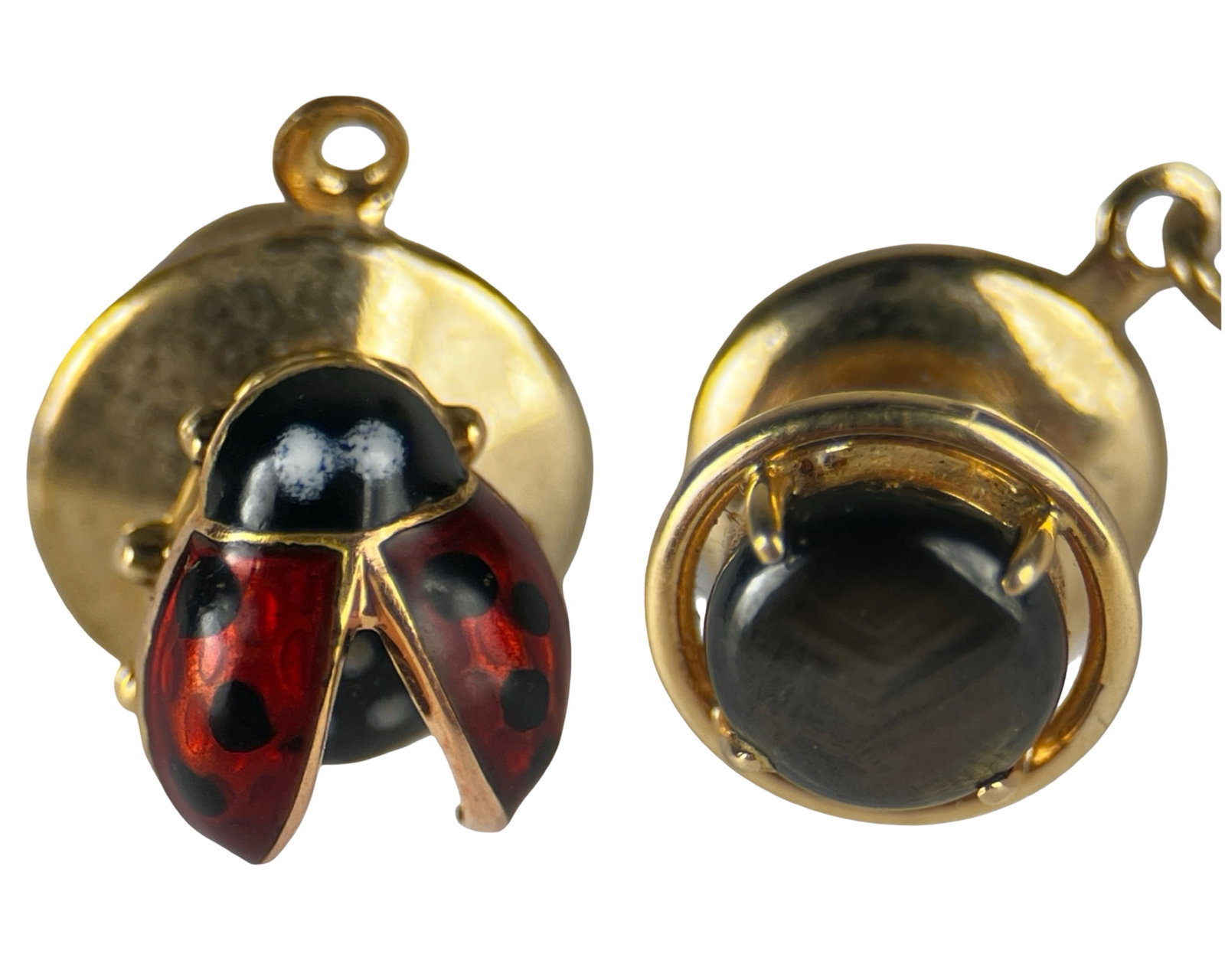14K Gold Men's Tie Tacks Ladybug and Black Stone: Lot of two vintage men's 14K yellow gold tie tacks / lapel pins. One features a red and black enamel ladybug design, marked 14K and Germany. The second features a round dark stone cabochon set in a 14