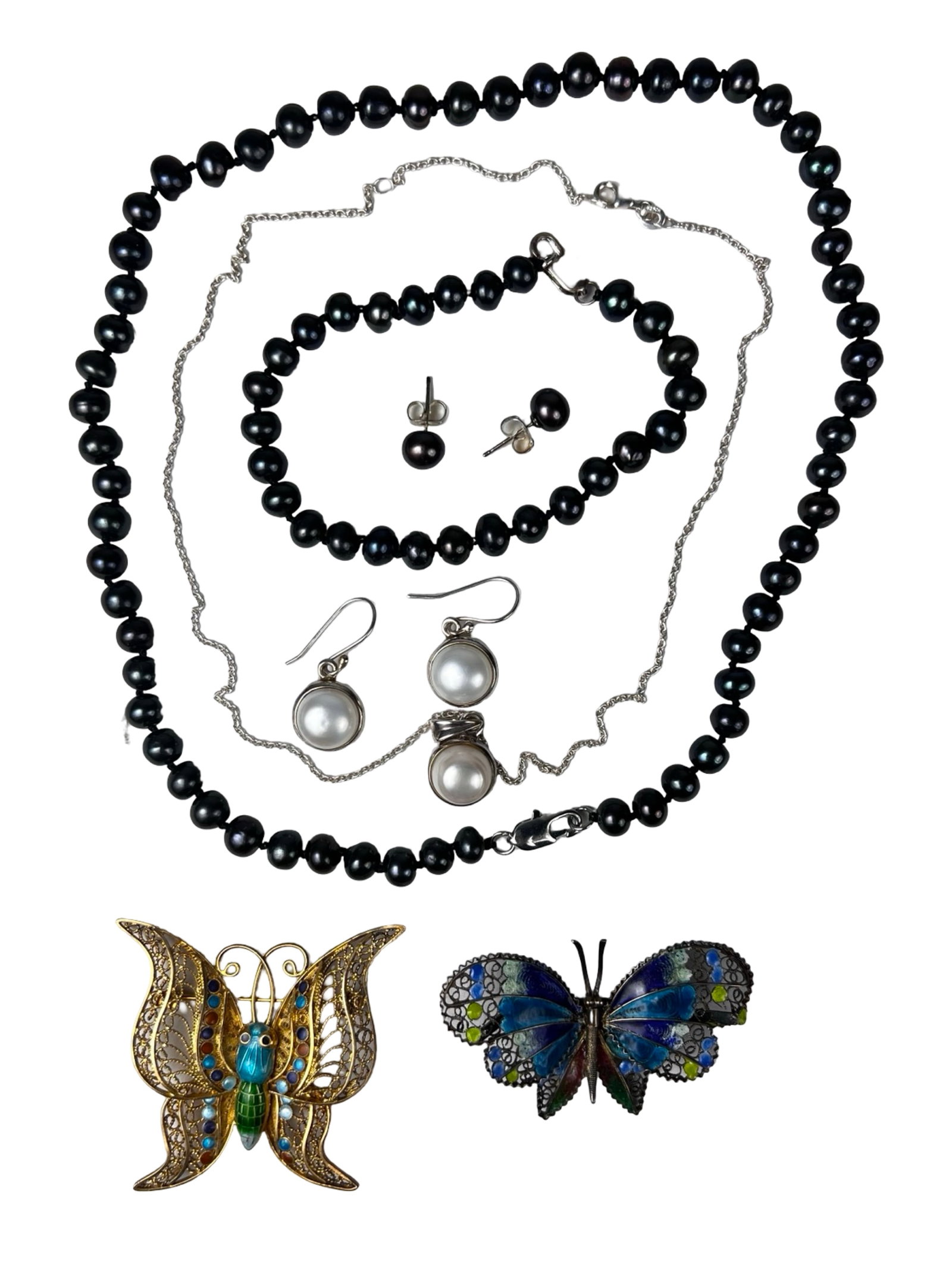 Sterling & Pearl Jewelry w/ Filigree Butterfly: Elegant assortment of sterling silver and pearl jewelry including a cultured freshwater black pearl necklace, bracelet, and matching stud earrings set; sterling silver necklace and earring set