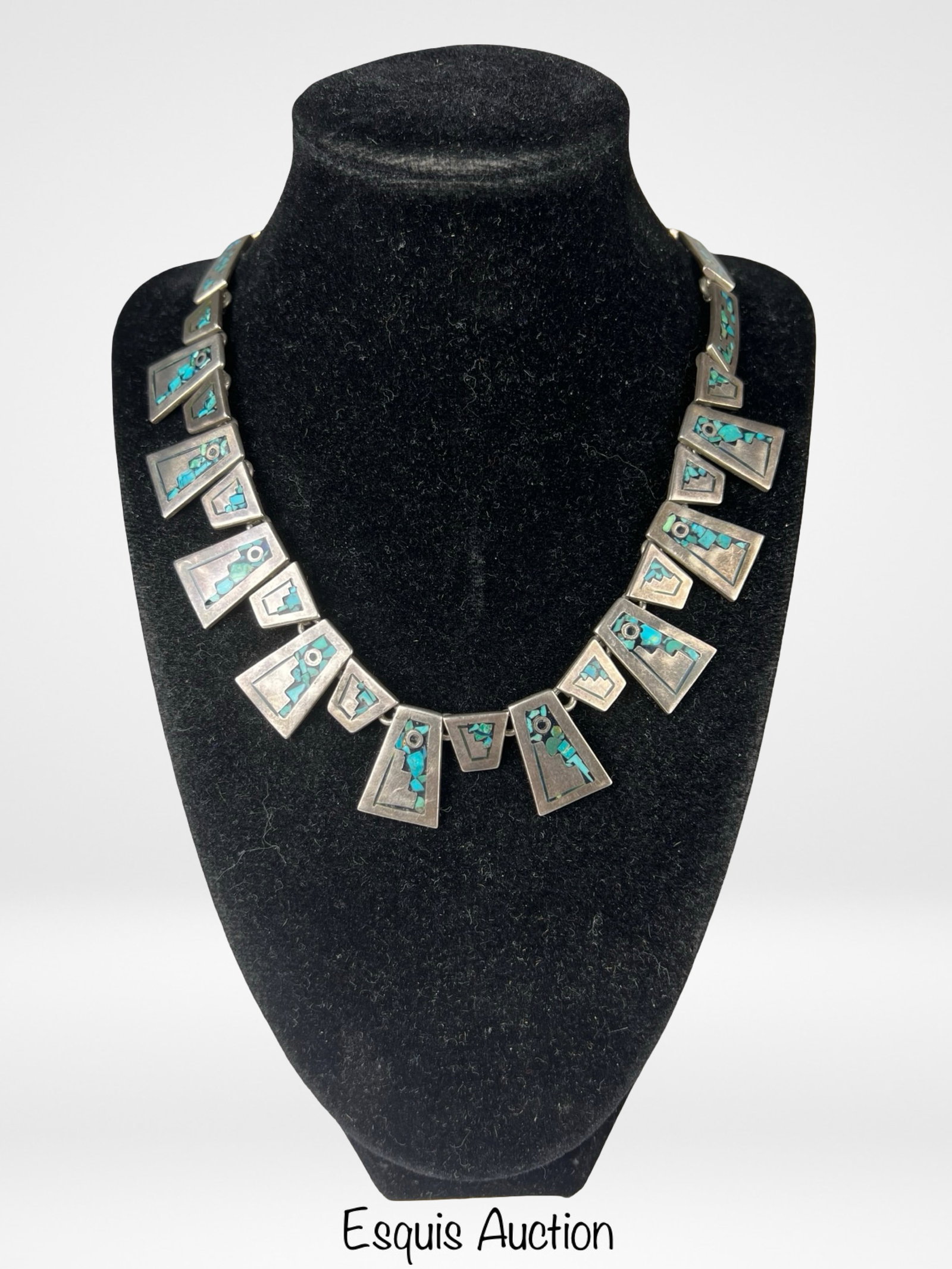 Massive Taxco Sterling Silver Turquoise Necklace: Striking vintage sterling silver necklace from Taxco, Mexico, featuring a bold geometric design composed of articulated trapezoidal panels. Each panel is inlaid with turquoise mosaic in abstract, mode