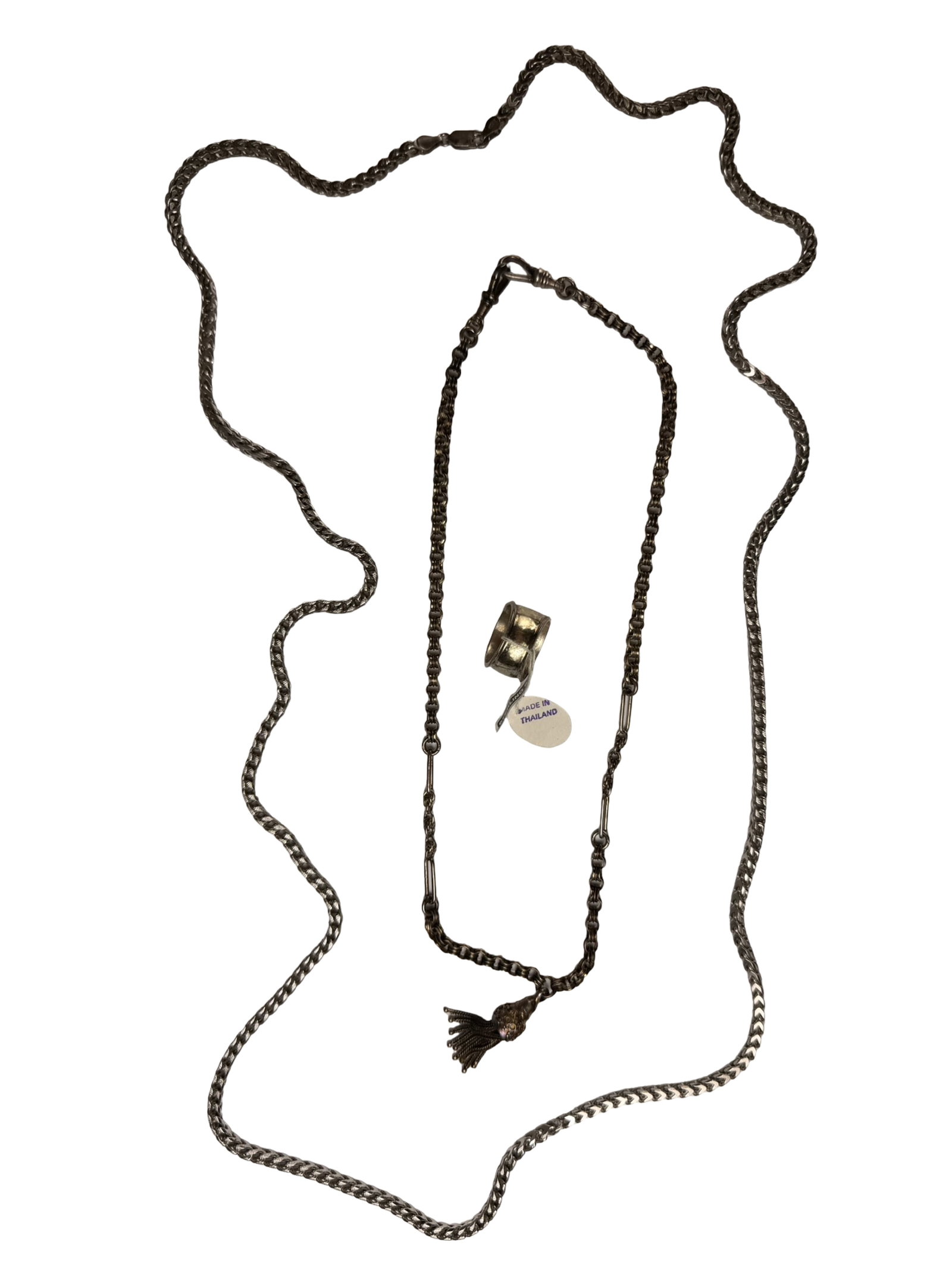 Sterling Silver Jewelry Assortment- 40" Necklace: Group of sterling silver jewelry including a massive woven chain necklace measuring approx. 40" long, a decorative sterling silver tassel necklace in a Byzantine-style link design measuring approx.