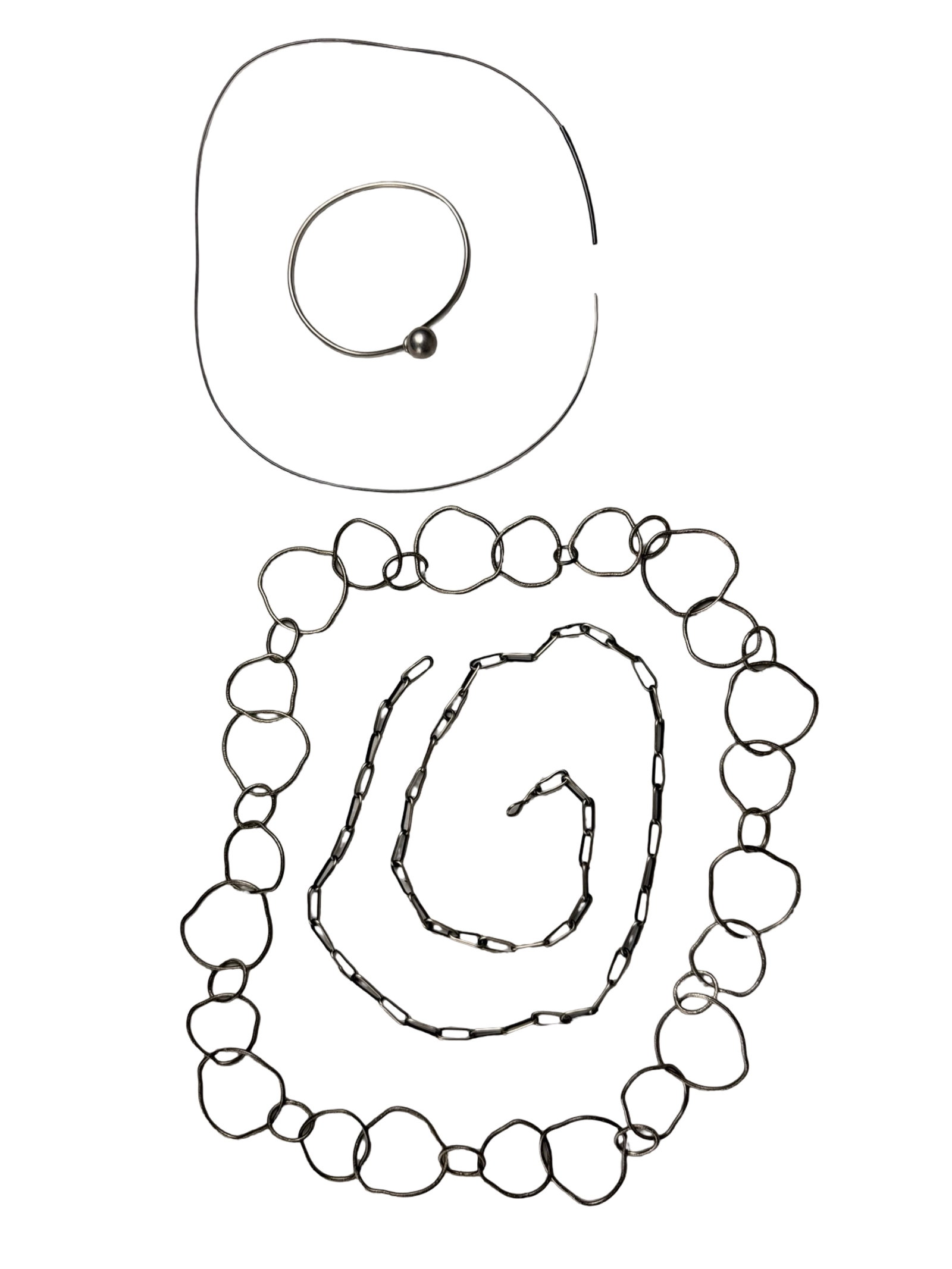 Sterling Silver Modernist Jewelry Collection: Collection of sterling silver modernist-style jewelry featuring minimalist and contemporary designs. Includes an organic open-link necklace, elongated paperclip link necklace, sleek wire choker neckla