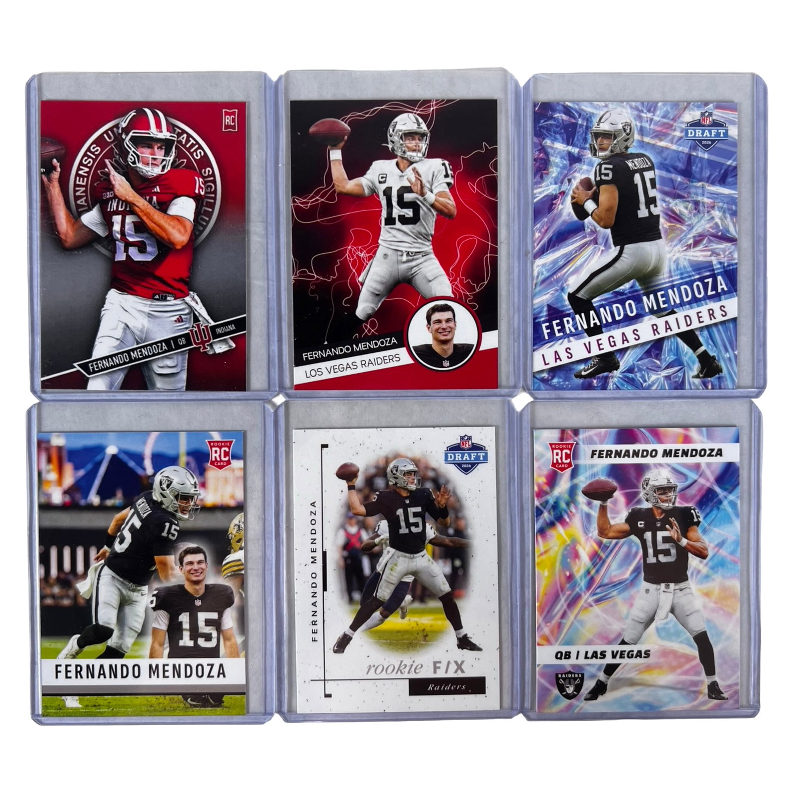 Fernando Mendoza Rookie Football Card Collection: Collection of 6 Fernando Mendoza rookie football cards featuring the quarterback in Las Vegas Raiders and Indiana Hoosiers themed card designs. Includes modern rookie and draft-style issues