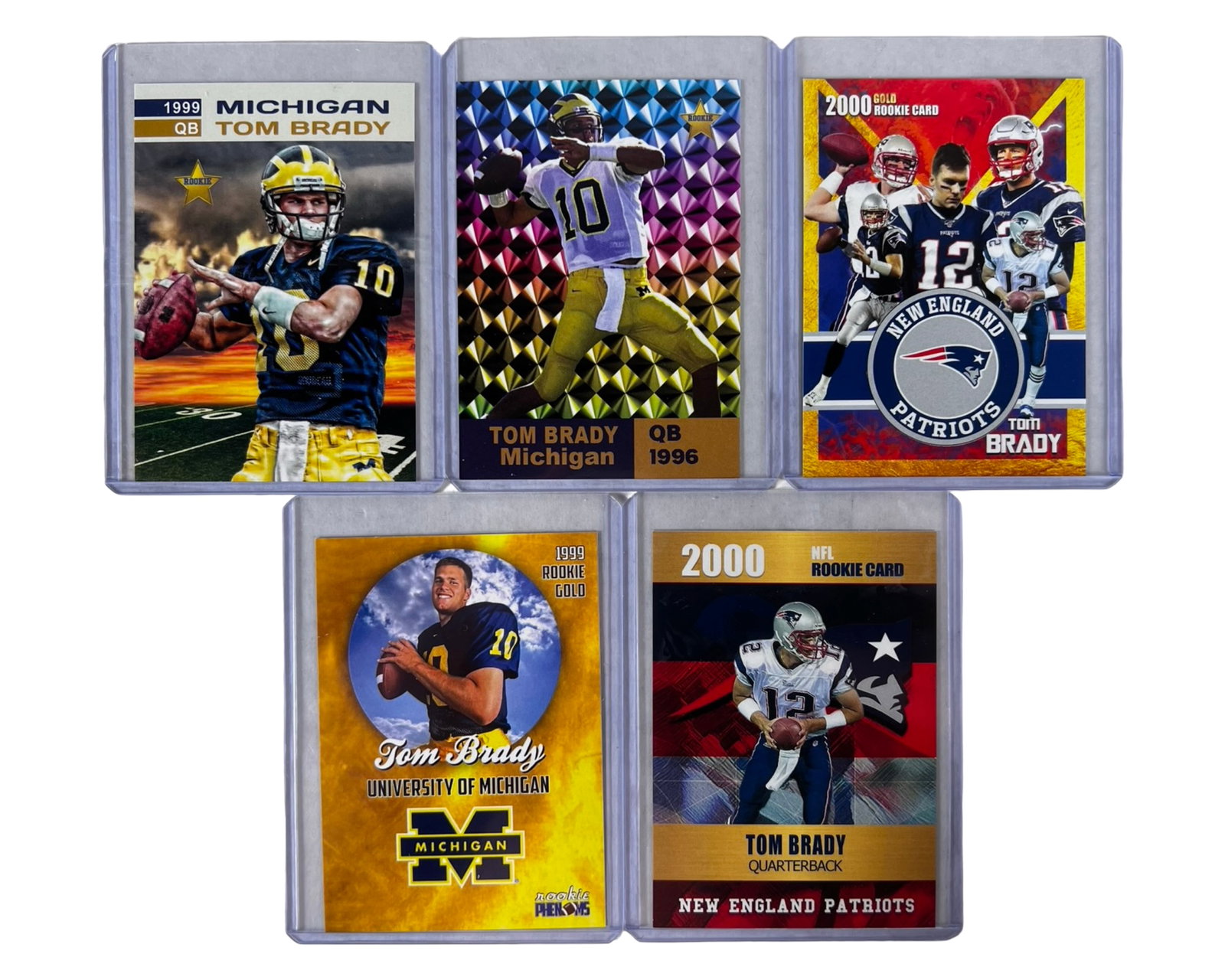 Tom Brady Rookie Football Cards - Lot of 5: 5 Tom Brady rookie football cards featuring the legendary quarterback during his University of Michigan and New England Patriots years. The lot includes rookie cards with colorful designs