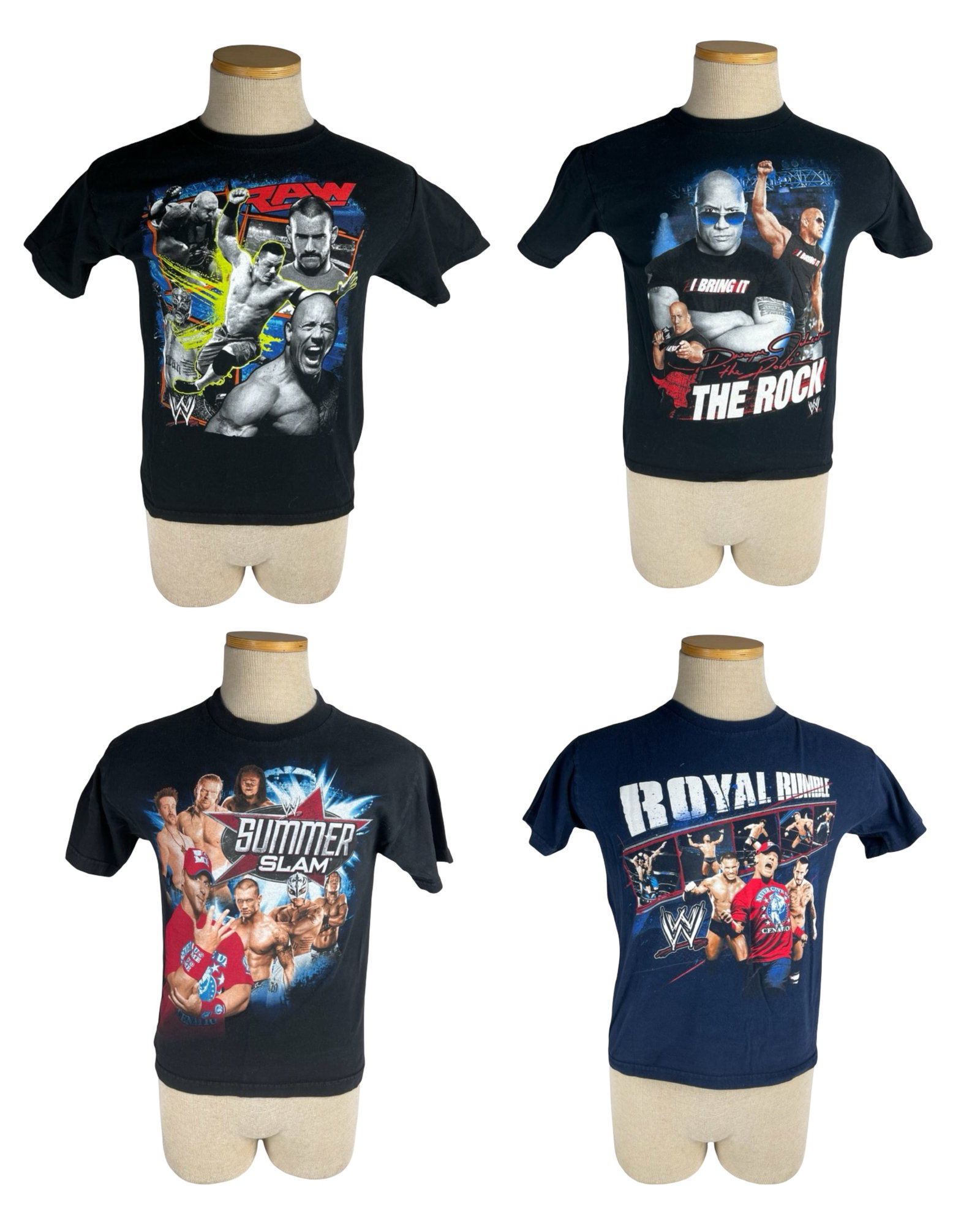 WWE Wrestling Graphic T-Shirts- Rock, Cena, Orton: Group of four vintage WWE wrestling graphic T-shirts featuring iconic wrestling superstars and events including The Rock, John Cena, CM Punk, Randy Orton, Rey Mysterio, SummerSlam, Royal Rumble, and