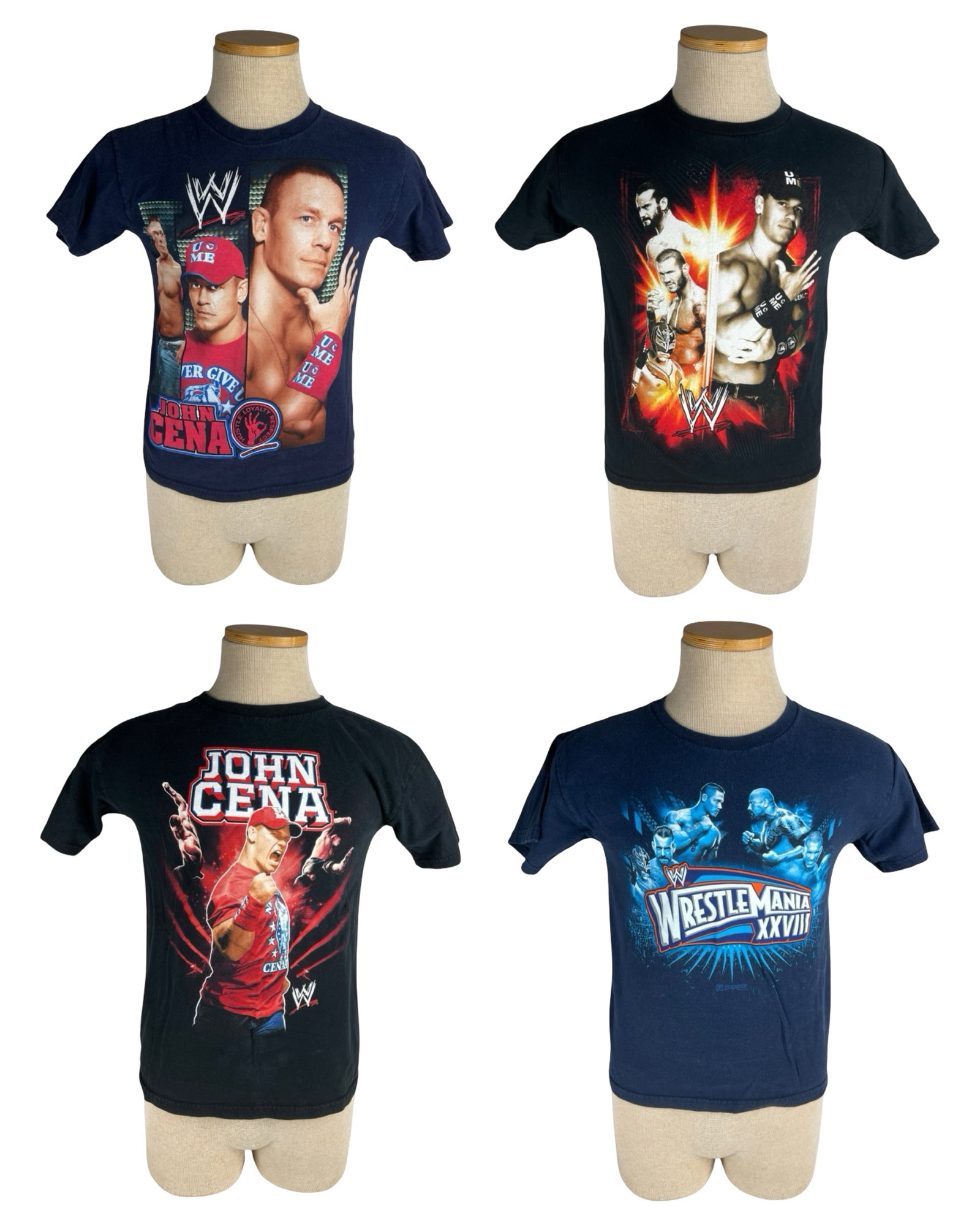 WWE John Cena & WrestleMania T-Shirts - CM Punk: Group of four vintage WWE wrestling graphic T-shirts featuring John Cena, CM Punk, Randy Orton, Rey Mysterio, and WrestleMania XXVIII themed designs. Includes multiple John Cena shirts with bold