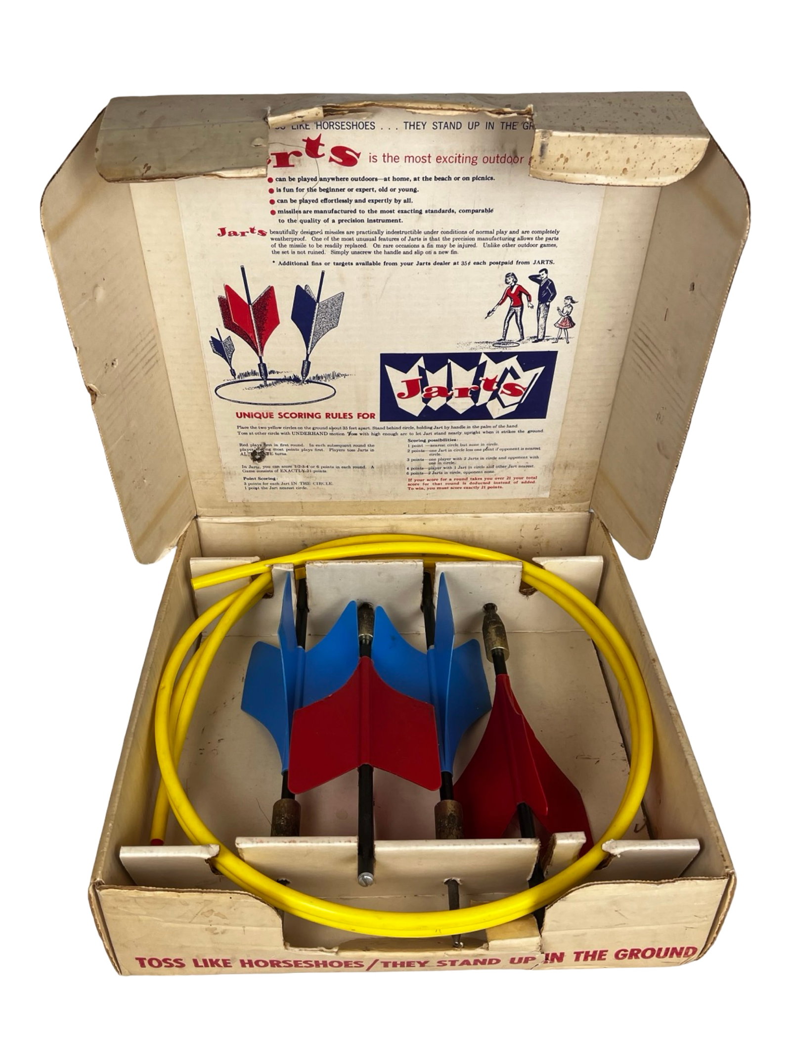 Vintage Jarts Outdoor Missile Darts Game: Classic vintage Jarts Missile Game, a nostalgic yet now-banned outdoor lawn dart set. Includes four metal-tipped darts (two red, two yellow) and two yellow target rings, housed in the original printed
