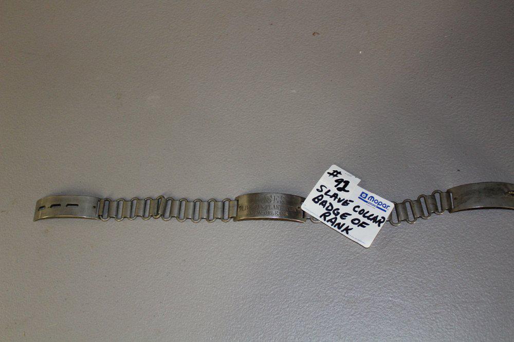 Slave collar circa 1850-1860 metal collar for slave: Slave collar circa 1850-1860 metal collar for slave showing him by name Moses as high-ranking slave as an overseer of other slaves wth name of New Orleans Live Oak plantation
