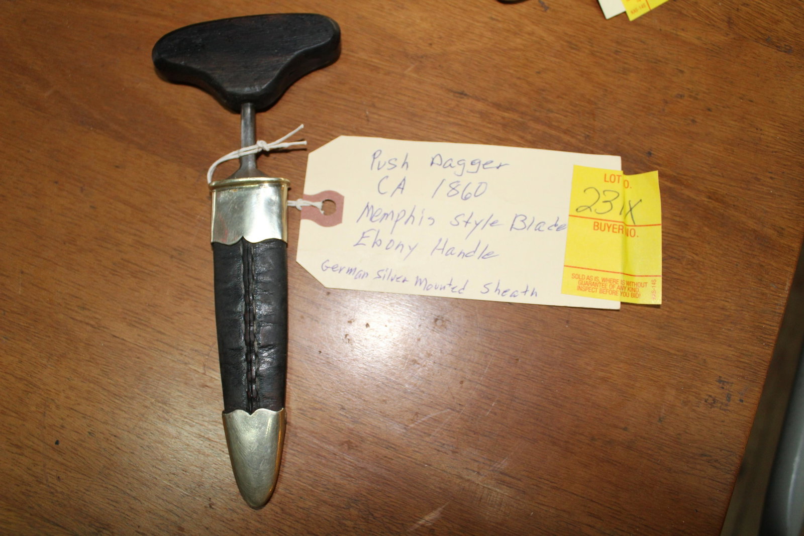 Push style dagger ca. 1860: Push style dagger ca. 1860 Memphis style blade, ebony handle, German silver mounted sheath