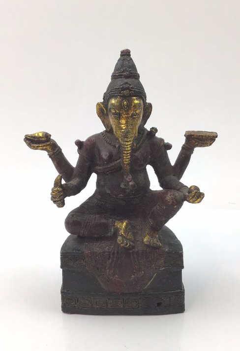 Antique Ganesh Buddha elephant bronze statue: Antique Ganesh Buddha elephant bronze statue. This statue has some green, red and gold tones on it. Each of the 4 arms are holding something different. Good overall condition and weight. About 2 3/4" 