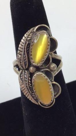 Native American Navajo Sterling Yellow Stone Ring: Vintage native American Navajo sterling silver ring floral leaf design with 2 oval yellow stones. Good overall condition. Size 7 5.34 G $12.00 US Shipping