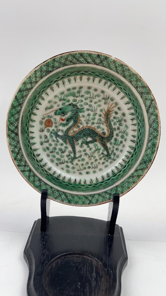 Chinese Porcelain Famille Verte Dragon Dish 19Th C.: Antique Chinese Porcelain Famille Verte Dragon Dish 19Th C . Very pretty green and gold tons. painting of a dragon playing with a ball. Small chip to the one lip. Very unnoticeable. some paint wear fr