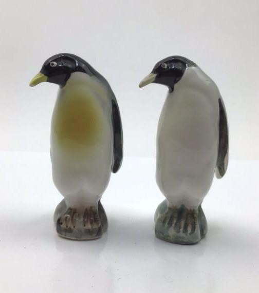 Japan Porcelain Penguin Salt and Pepper Shakers: Vintage made in Japan porcelain penguin salt and pepper shakers. Good overall condition some wear due to age and use. Both have stoppers in the bottom. About 3.5"h x 1.5"w