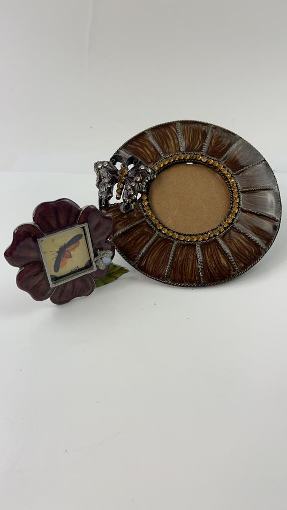 Pair Metal Enamel Butterfly Picture Frames: Very Pretty Pair Metal Enamel Butterfly Picture frames. Good Overall condition. No rhinestones missing. Hanging Larger frame measures about 5 3/8"L x 5"W smaller standing frame 3 1/8"L x 2 1/2"W