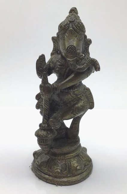 Antique Bronze Tibetan Buddhist Ganseha Elephant: Antique Bronze Tibetan Buddhist Ganseha elephant statue. Good detail and weight. Good overall condition. Elephant is sitting with one hand up and one foot crossed. Very pretty item. About 6" Tall x 3"