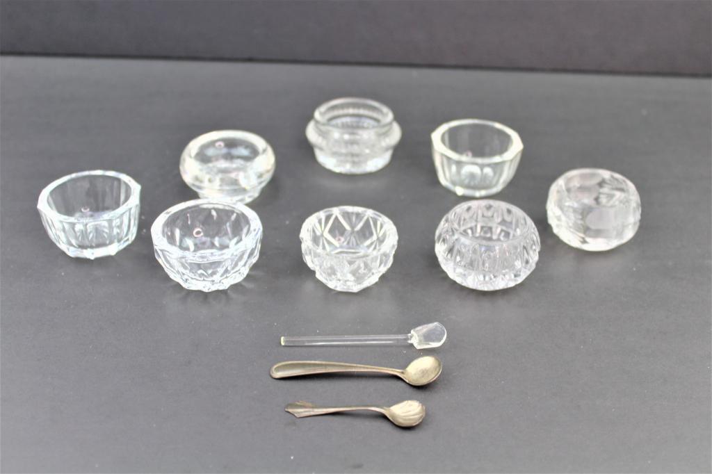 Lot of 8 Crystal Salt Cellars with 3 Spoons: Lot of 8 Small Crystal Salt Cellars with 2 Sterling spoons and 1 Glass Spoon. All in Good Overall condition Measuring about 2"w x1"t. All Have pretty and differnt designs. $15.00 US Shipping