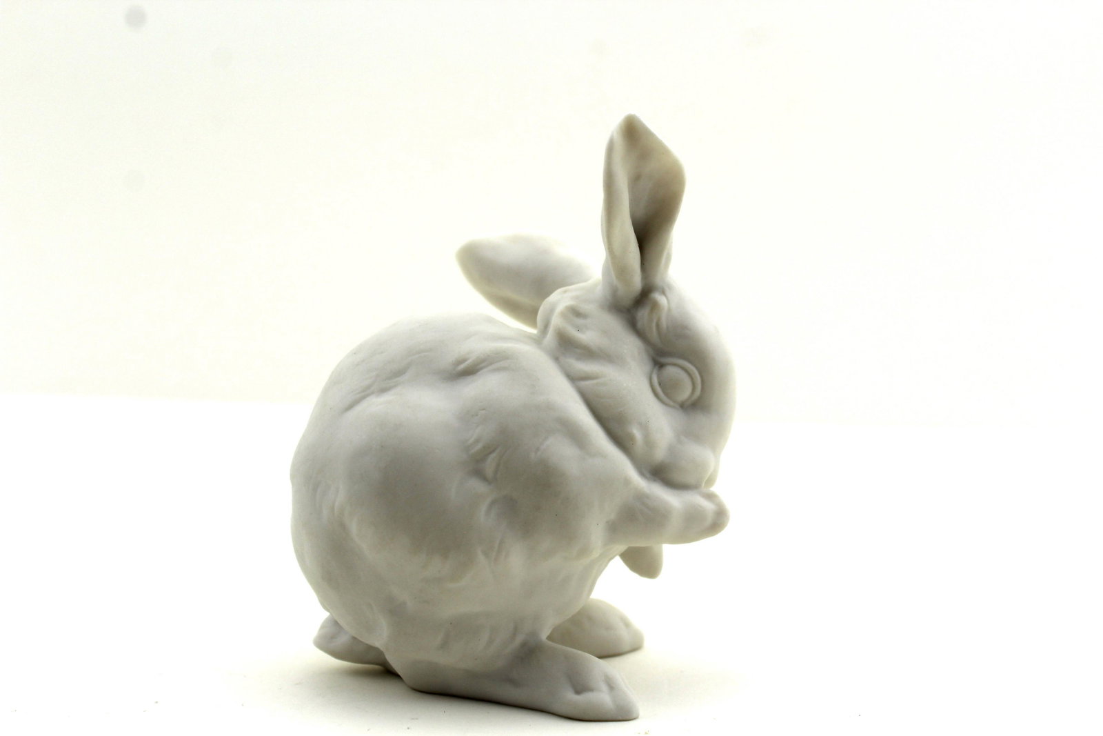 1814 German Porcelain Bunny Statue Figure: Antique 1814 german Porcelain Bunny with a stamp on the bottom of a lion and 1814. Good Overall Condition .3" x 2.5"