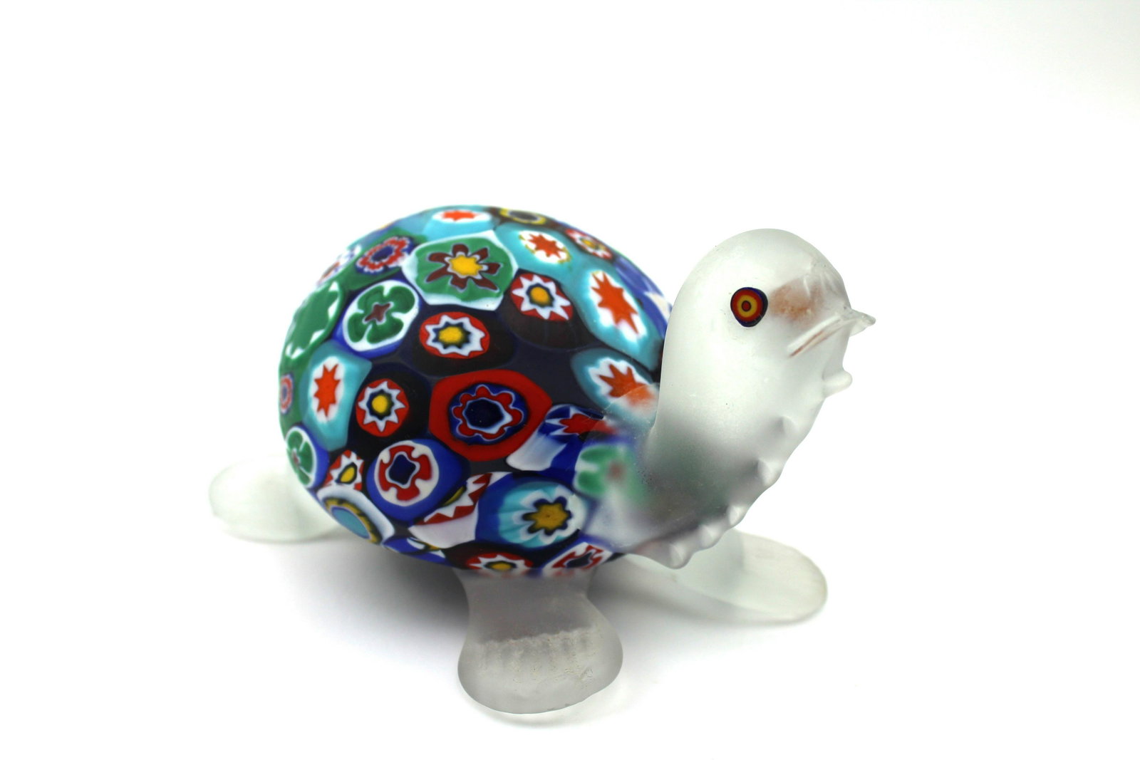 Millefiori Glass Frosted Turtle Figure: Millefiori Glass Turtle Figure with Frosted head and feet. Millefiori Beads for eyes. Good Overall condition and weight. Has a small chip to upper lip. 3" x 5.5"