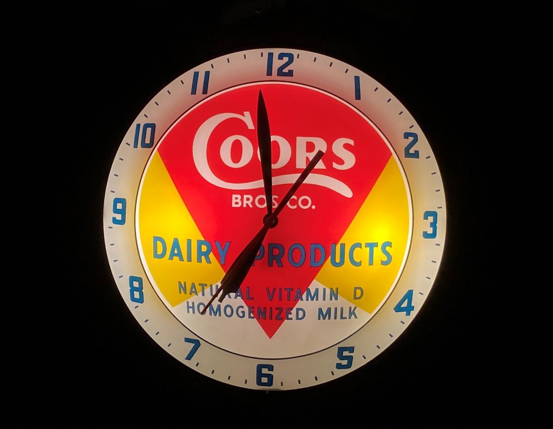 Coors Bros. CO. Dairy Products Double Bubble Clock: Coors Bros. CO. Dairy Products Double Bubble Clock. In excellent condition. Lights up and runs perfectly. Has original Advertising Products decal on back. 15" Diameter. Rated 9.5 by The Authentication