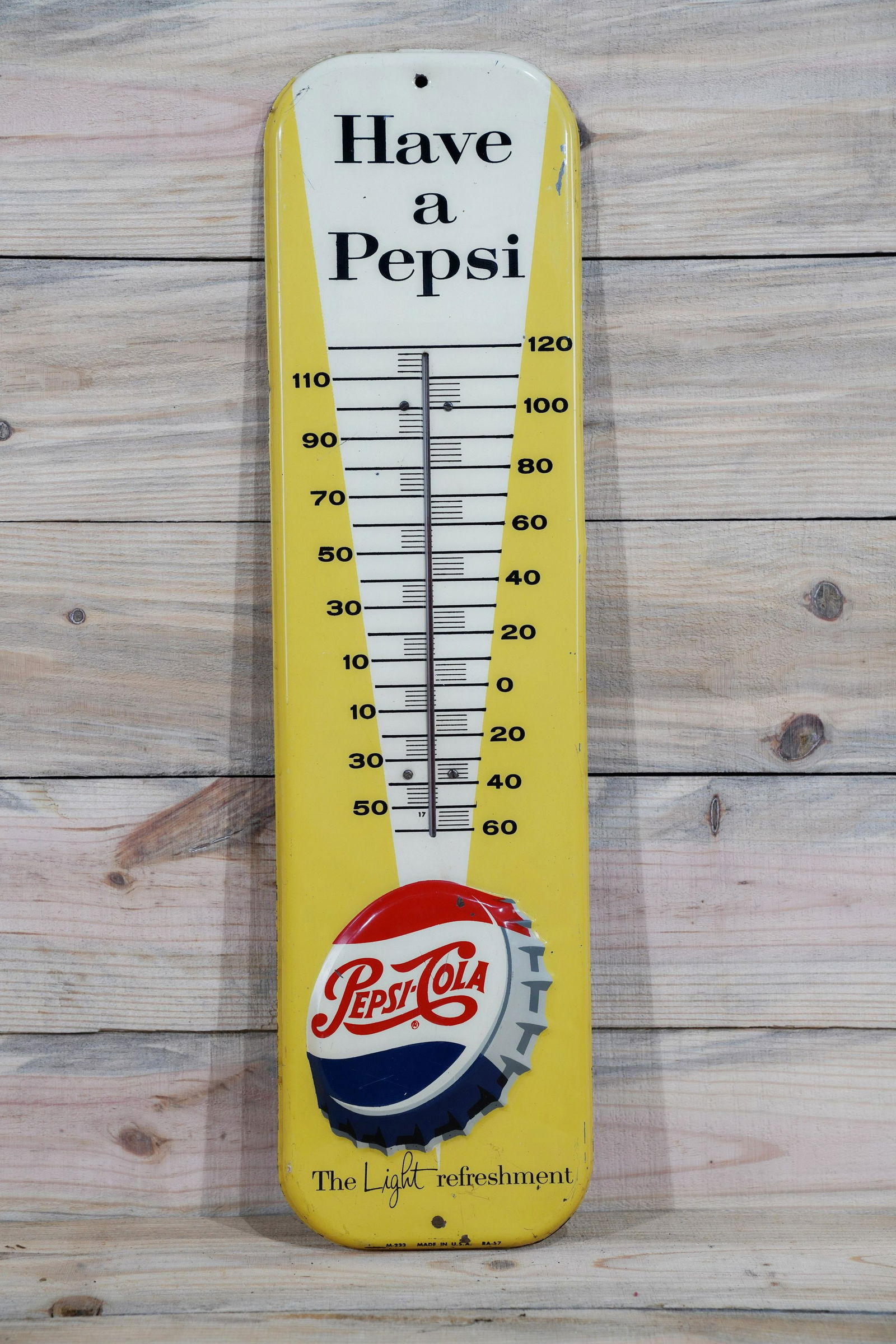 1957 Have A Pepsi Bottle Cap Logo Thermometer TAC 8: 1957 Have A Pepsi Bottle Cap Logo Metal Thermometer. Good color and shine with light wear and fine scratches. Tube is good. Dated 1957. Measures 27"x7". Rated 8 by The Authentication Company (TAC #038
