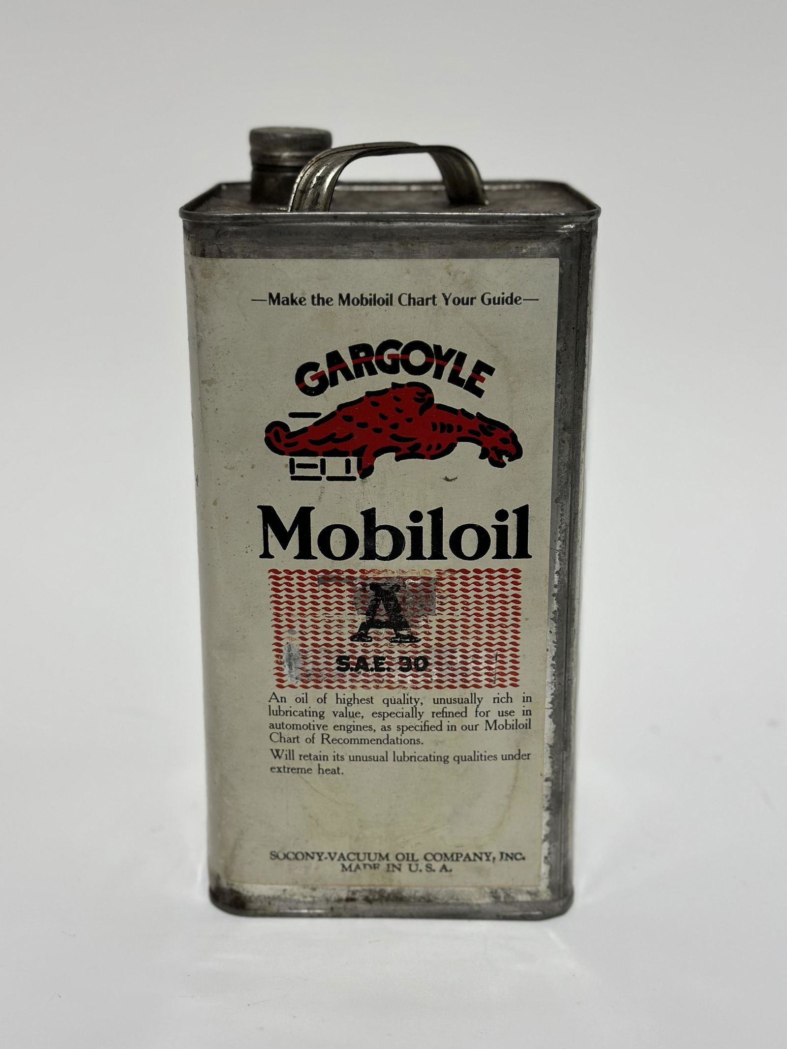 Mobiloil Gargoyle "A" 1 Gallon Oil Can: Empty 1 gallon metal can. Shows some light wear with very minor denting at corner. Includes cap. Should clean well. Richmond Auctions guarantees this item to be authentic. For all items in this auctio