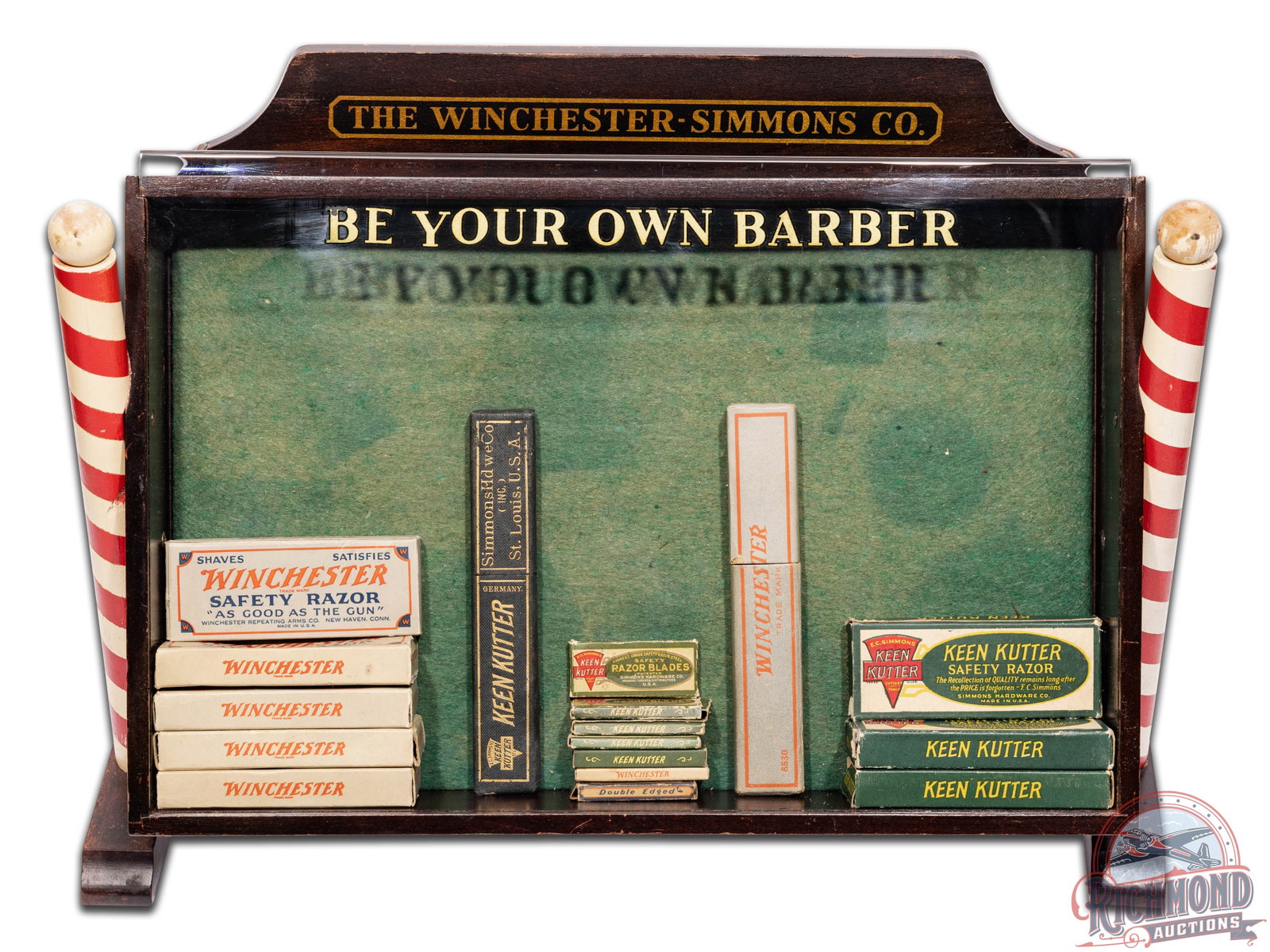 Winchester Simmons Co. Wooden Razor Display: It has a great original look and shows some light wear throughout with areas of paint loss. It displays very well with the glass front that retains the original decals. Includes safety and straight ra