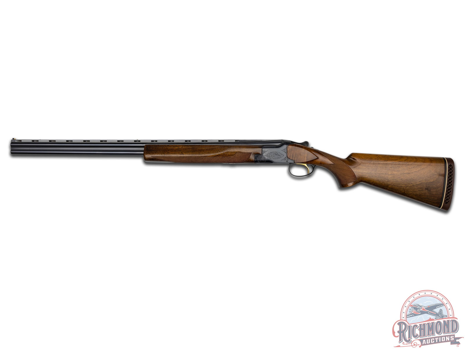 Engraved Belgian Browning Superposed .410 Grade I Shotgun: Manufactured in 1970 for Browning by FN in Belgium. Blued 26-1/2" over and under special steel barrels with raised ventilated rib, twin beads, fixed skeet and skeet chokes with 2-1/2" chamber and ejec