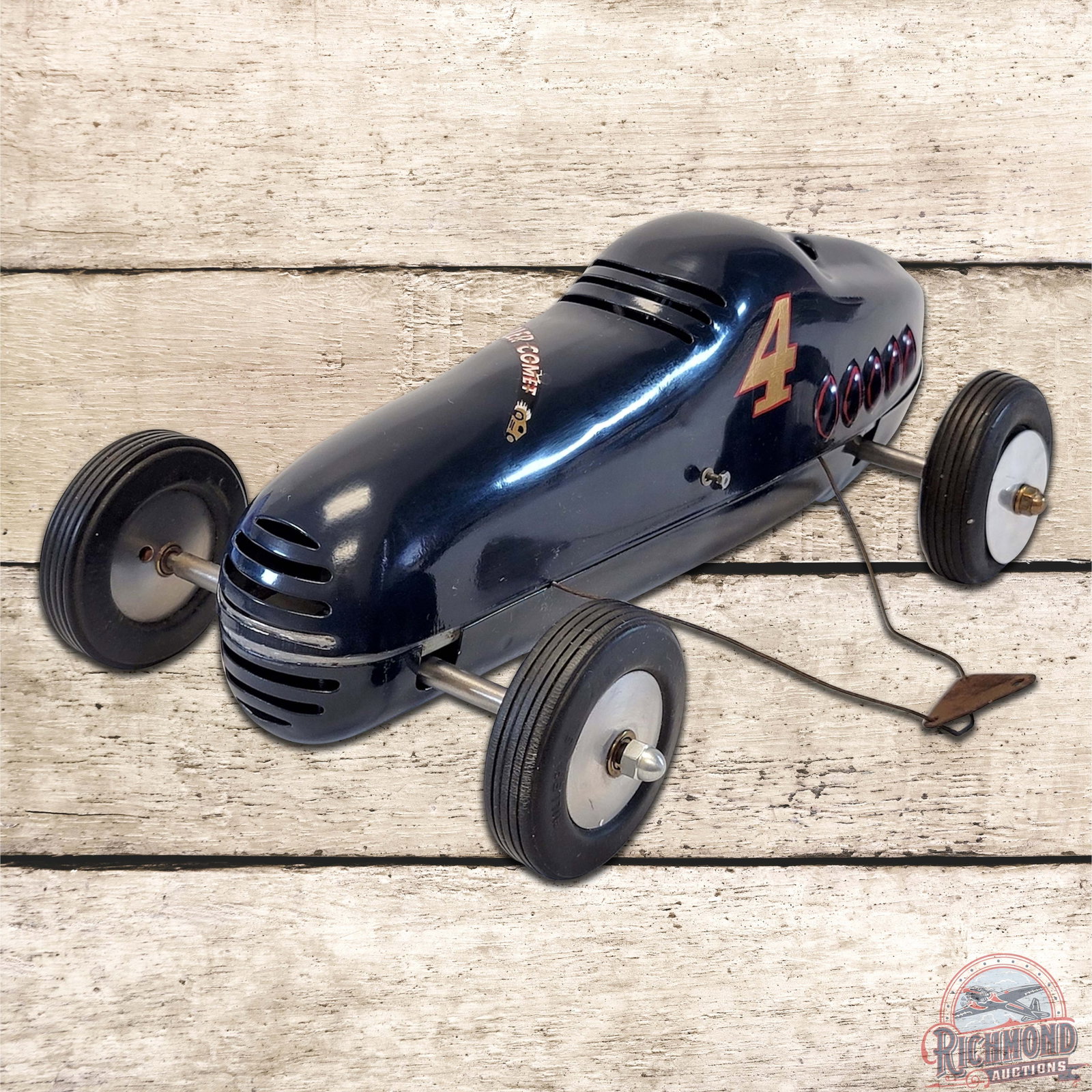 1942 Hiller Comet Tether Car: Stanley Hiller introduced the Hiller Comet in 1941 as a true innovation in the tether car world due to its pressed steel body. This example has a nice repaint but is otherwise original and complete, p