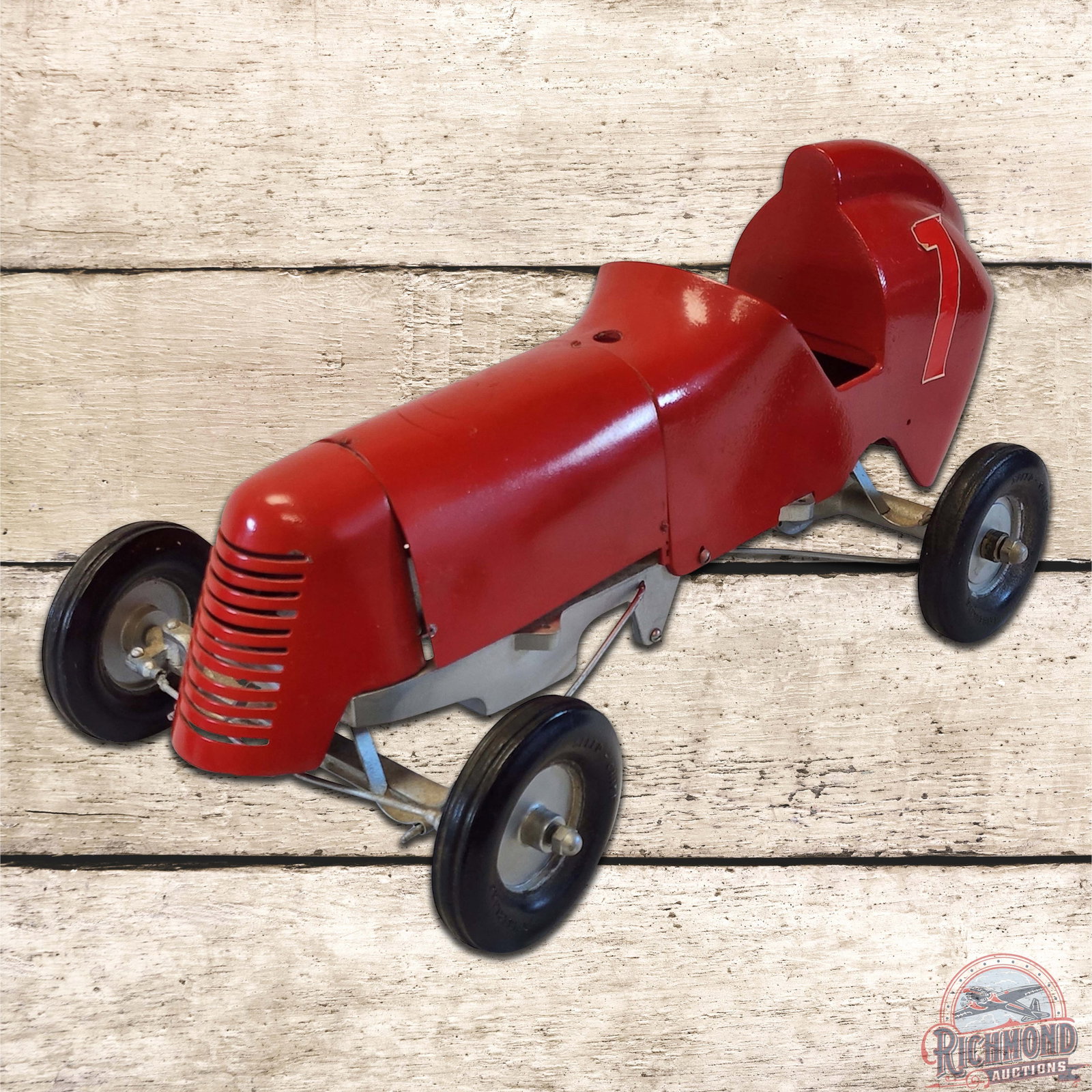 1940 Speed Chief Tether Car: One of the earliest of the metal bodied tether cars, the Speed Chief cars were distributed and sold by Sears Roebuck. This original car, with newer paint, has no engine or peripherals; the gearbox is 