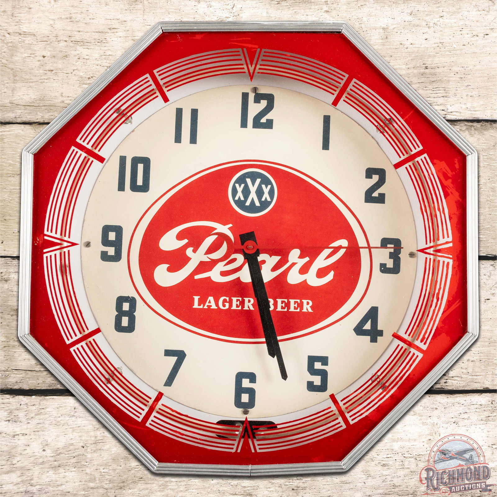 Pearl Lager Beer 18" Octagon Neon Advertising Clock: Octagon neon advertising clock features a large graphic of the Pearl Beer logo in the center field. The clock and neon both work as they should. The inner face is in excellent condition. The outer fac