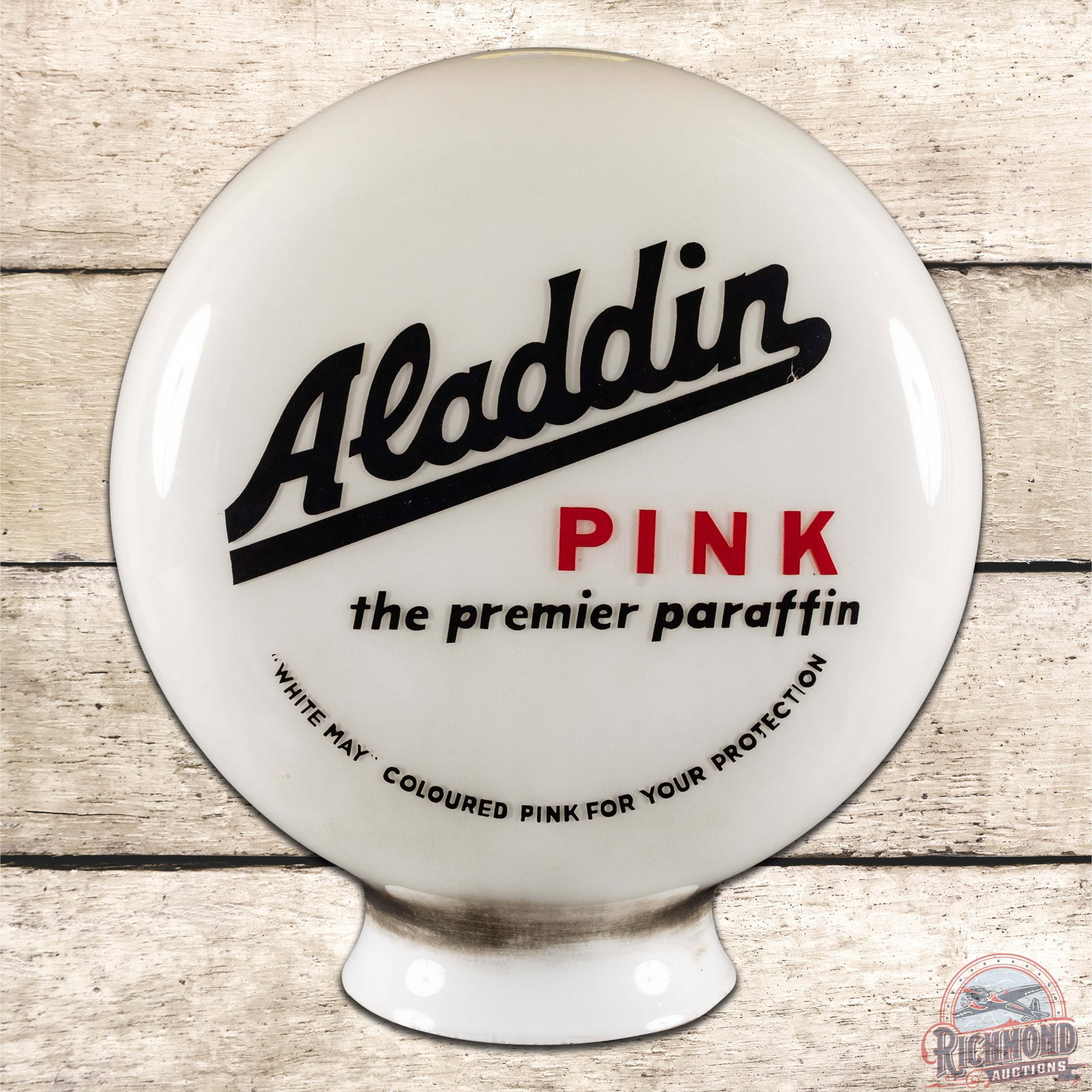 Aladdin Pink One Piece Baked Milk Glass Gas Pump Globe: One-piece baked globe has good overall color. Both sides display well. The ?Pink? lettering on each side has been redone in vinyl. The globe has small chips around the base and staining around the nec