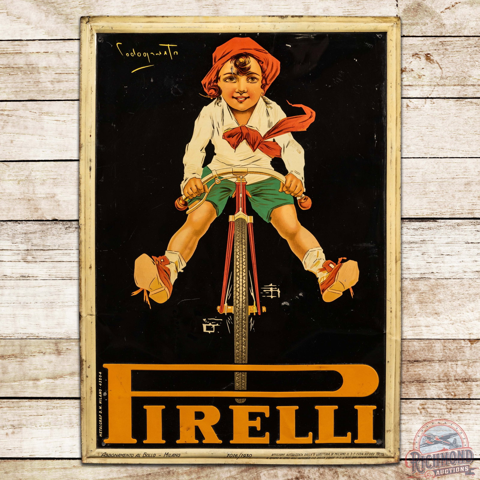 1934 Pirelli Bicycle Tires Embossed SST Sign w/ Graphics: SST (single sided tin) embossed self-framed sign has excellent color and shine. The field and perimeter have general age wear with small bends and paint chips. Marked Abbonamento Al Bollo - Milano 3-1