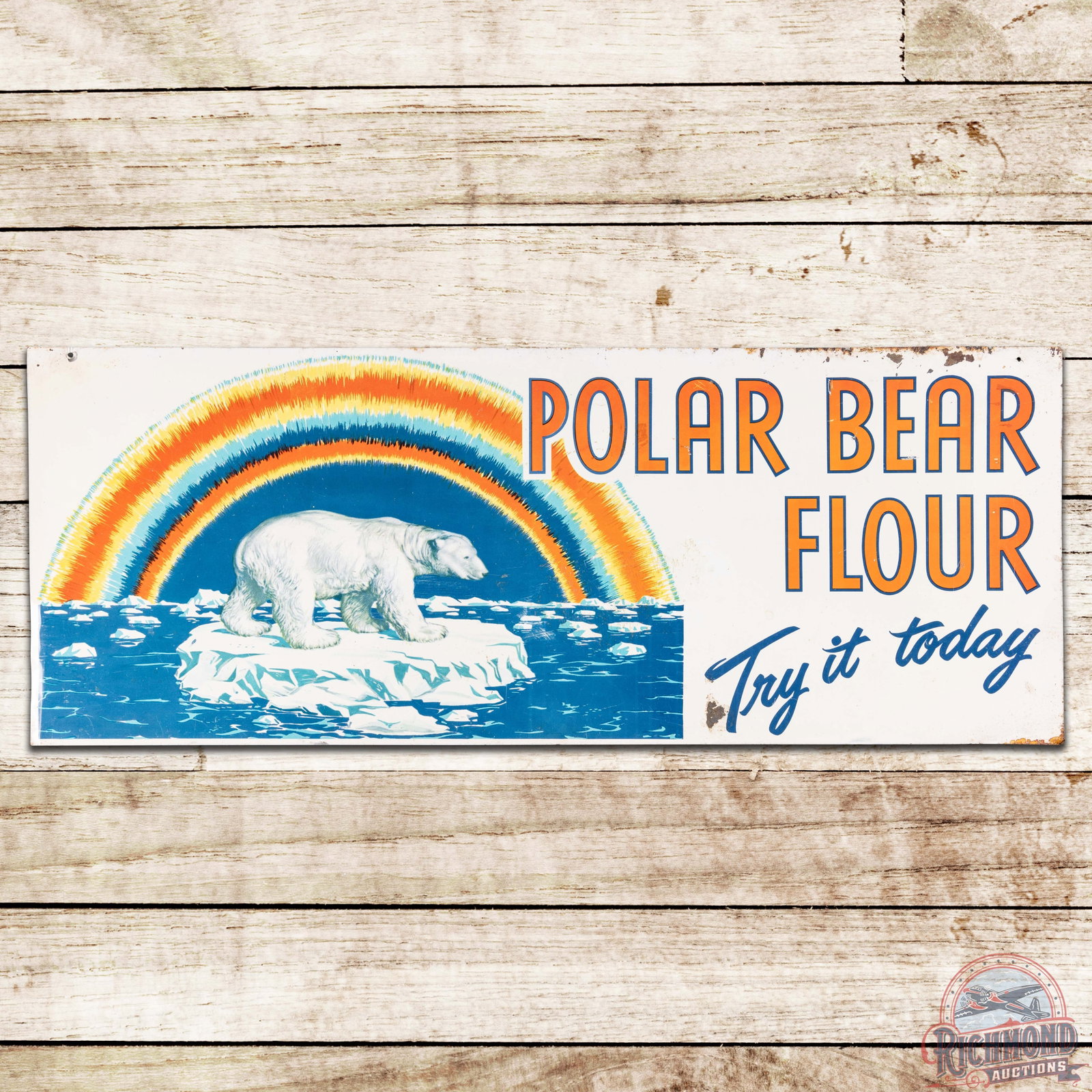 Polar Bear Flour Try it Today SST Sign w/ Rainbow: SST (single sided tin) sign has very good color and shine. The field has light wear with an area of raised paint and discoloration in the center. The perimeter has small bends and paint chips. The sig