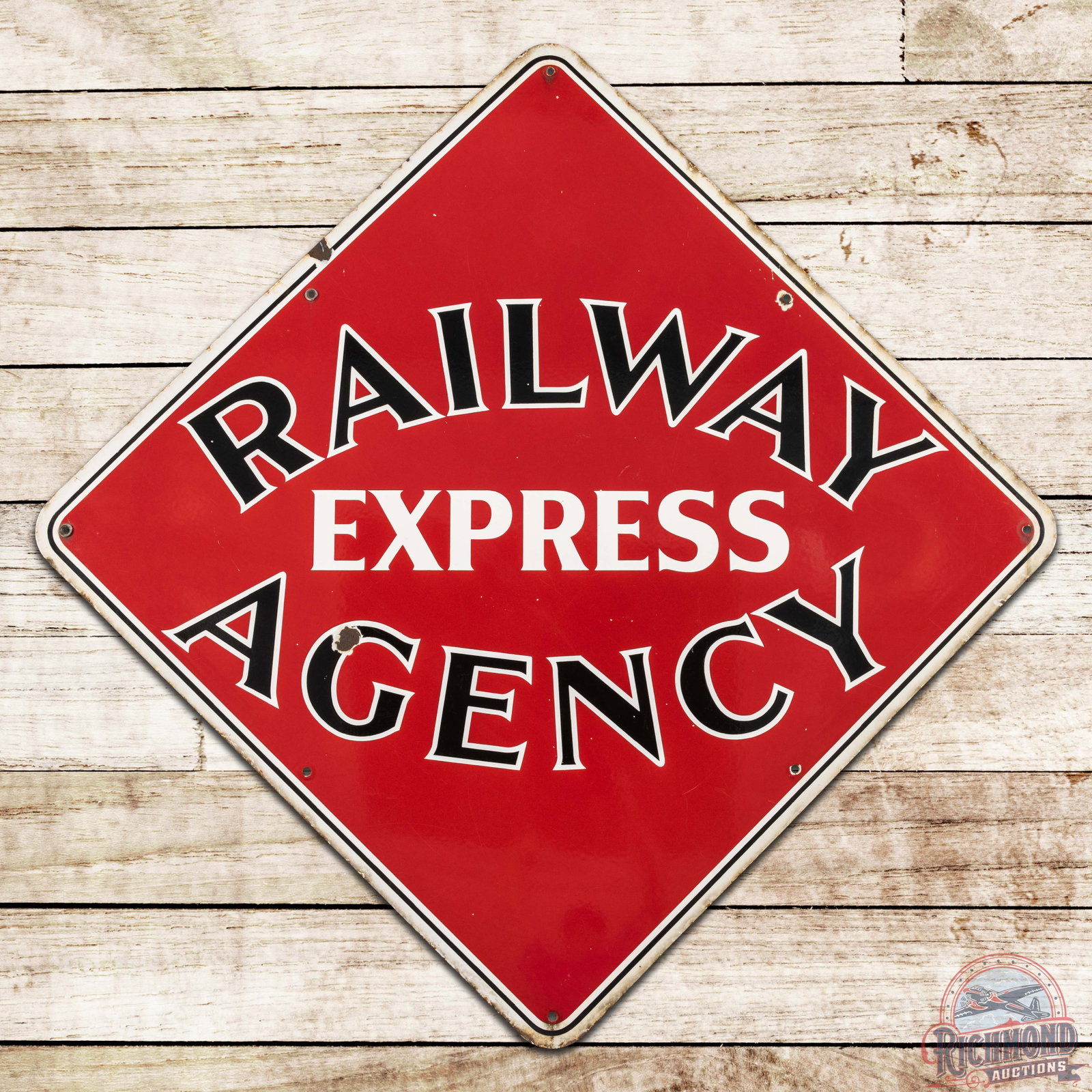 Railway Express Agency SS Porcelain Sign: SSP (single sided porcelain) sign has excellent color and gloss. The sign has great overall eye appeal with small chips in the field and general perimeter wear. The larger Railway Express Agency signs