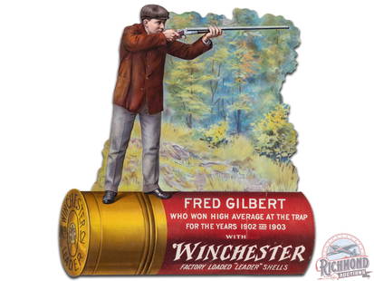 Winchester Fred Gilbert Die Cut Cardboard Easel Back Countertop Display Sign: Winchester Fred Gilbert die cut cardboard sign. It has good color and shows very light wear, mainly along the edge. It displays extremely well and is a very hard piece to find. Shrink wrapped and secu