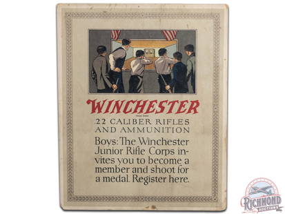 Winchester .22 Cal Rifles & Ammunition Cardboard Easel Back Countertop Display Sign: Winchester .22 Cal Rifles & Ammunition, The Winchester Junior Corps, easel back sign. It has good color and shows areas of wear, discoloration, and paper loss. The reverse shows more discoloration. It