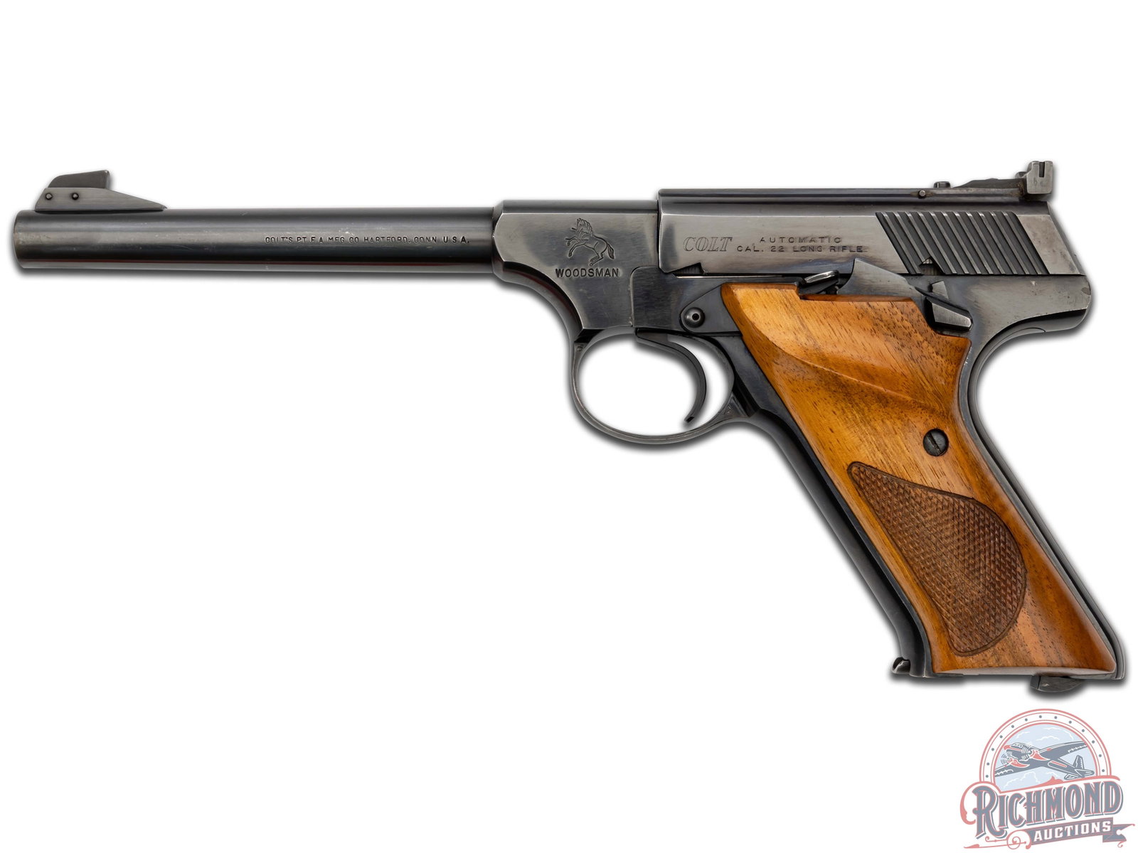 1964 Third Series Colt Woodsman Target .22 LR Semi-Automatic Pistol: Manufactured in 1964. Features a 6" blued round barrel stamped "COLT'S PTFA MFG CO HARTFORD, CONN USA" on the left side. Target blade front sight, rear adjustable notch sight. Blued frame with the Col